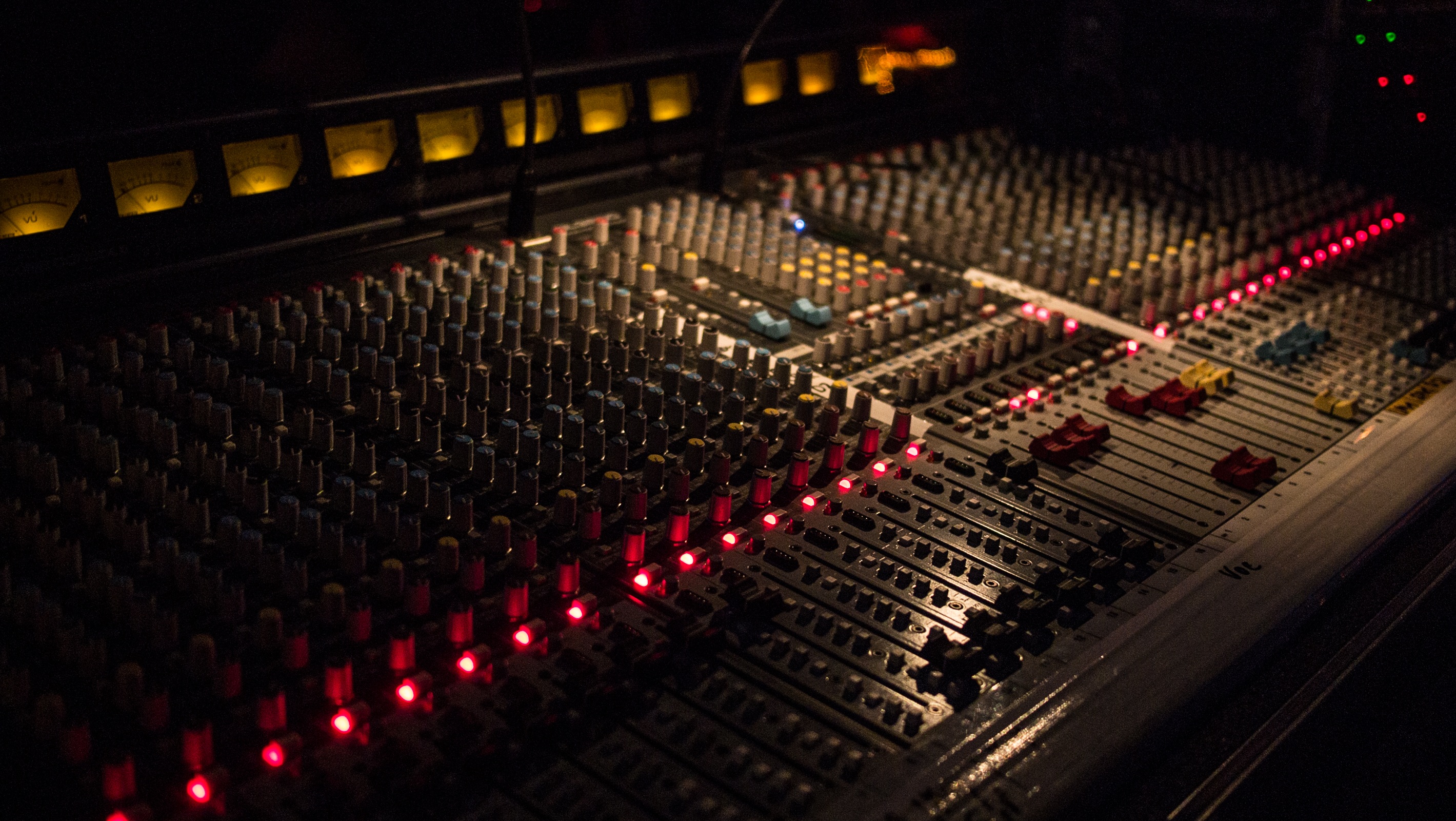 Desk of Sound Mixer in dark Studio free image download