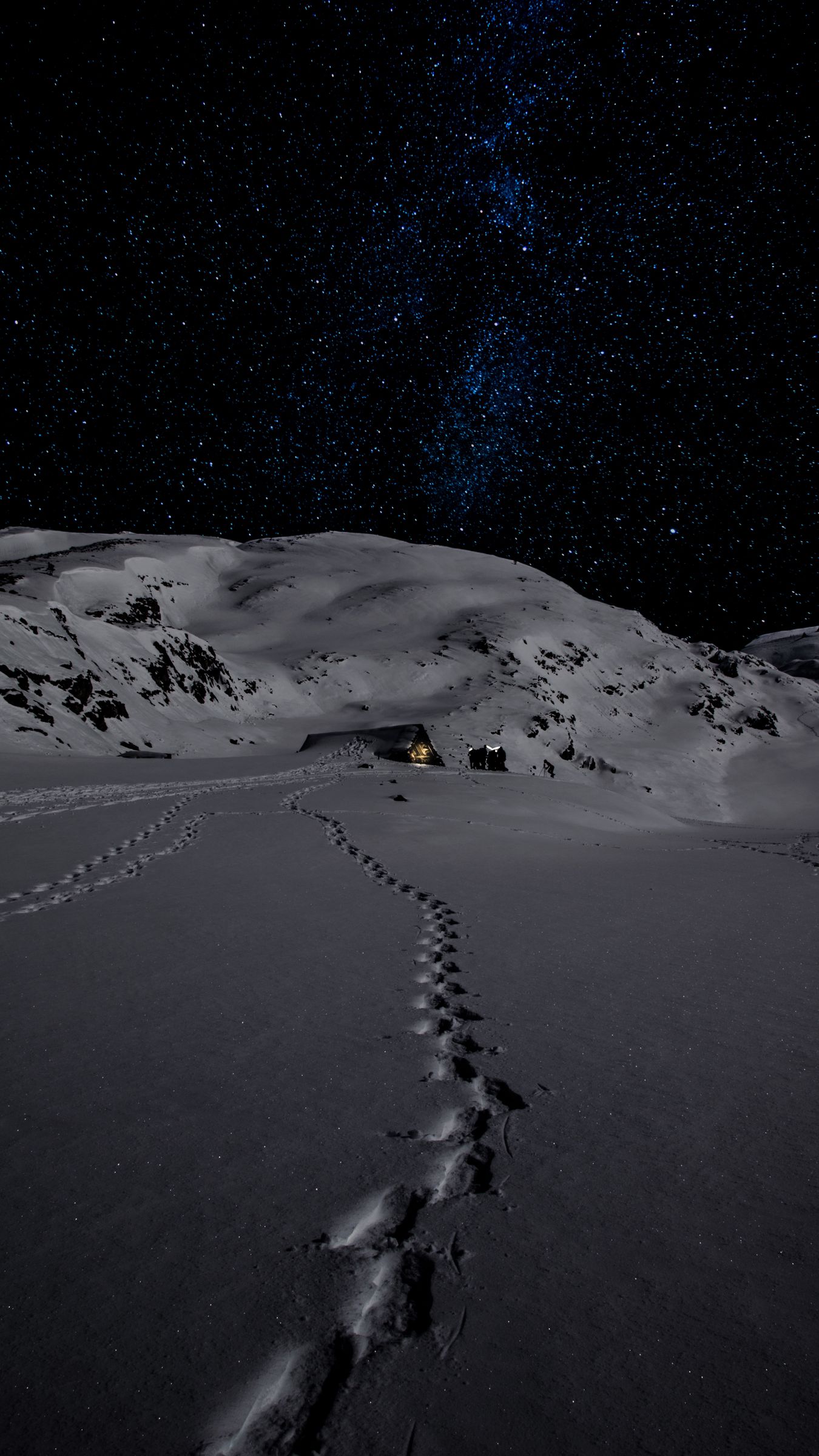 Download wallpaper 1350x2400 night, snow, mountains, footprints, winter iphone 8+/7+/6s+/for parallax HD background