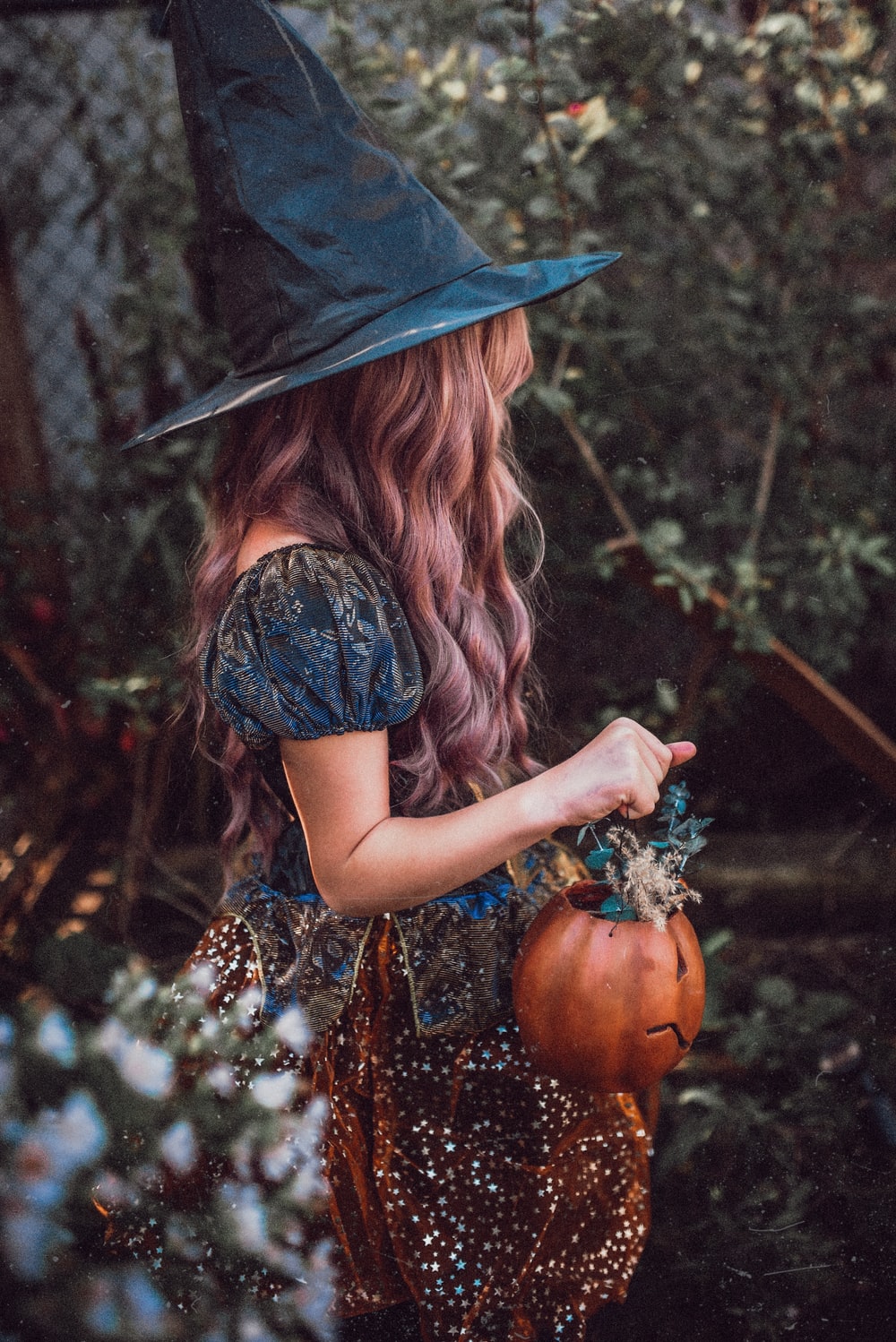 girl in witch costume photo