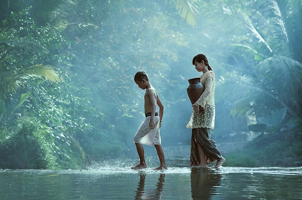 Girl And Boy In A Jungle