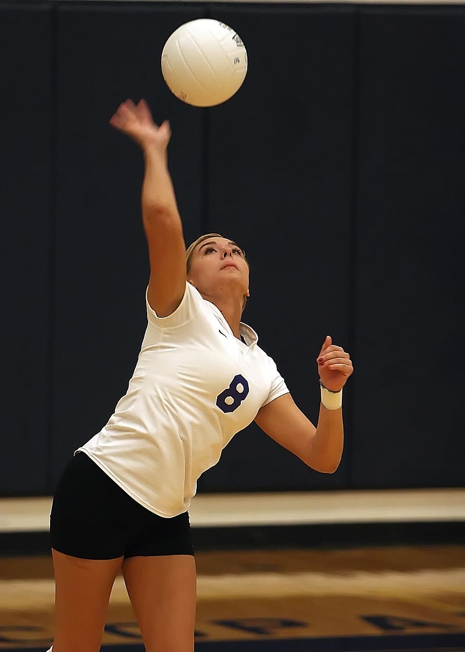 Woman Spiking White Ball, Volleyball, Player, Girl, Serving A Volleyball