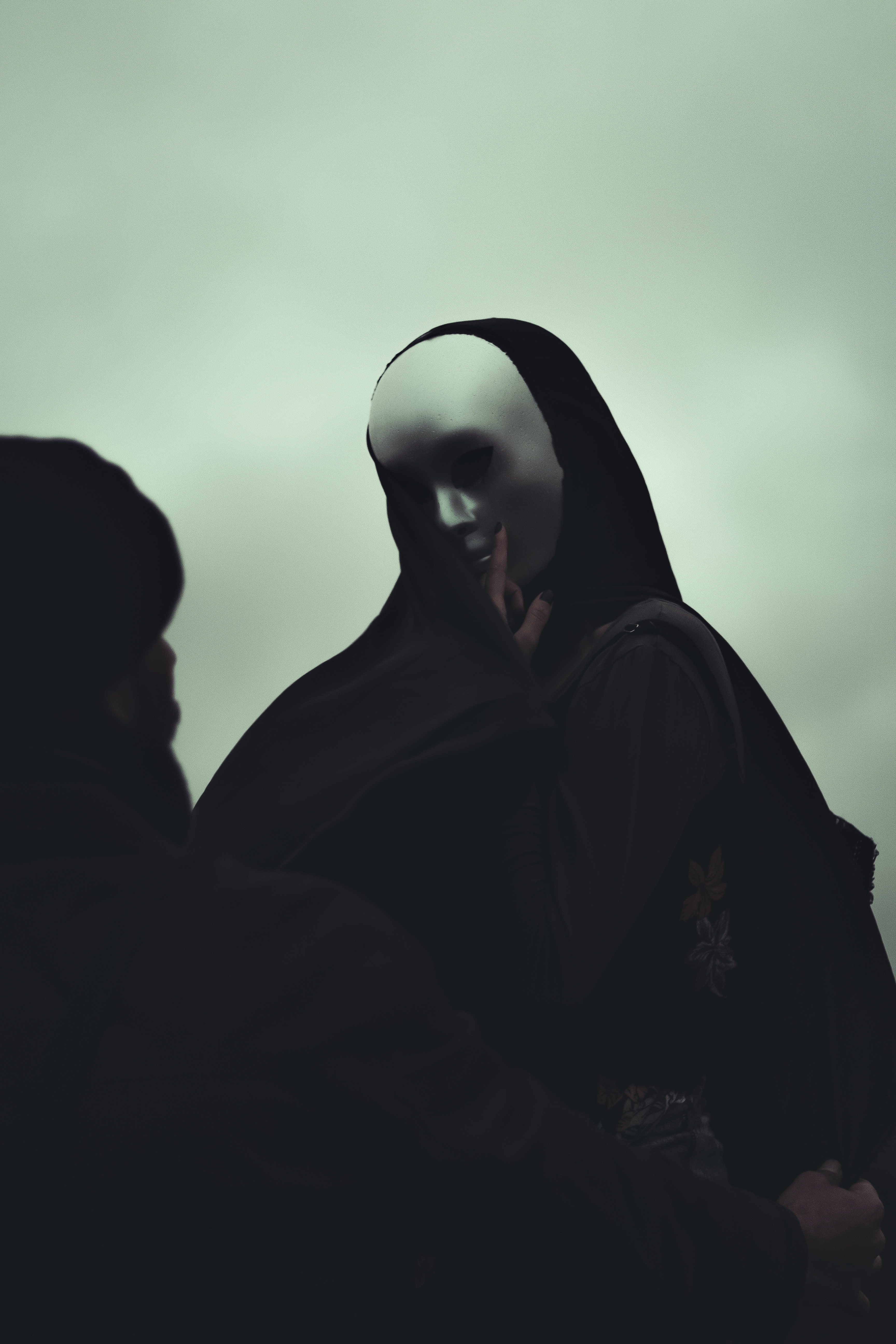 Mysterious person in mask and cape · Free