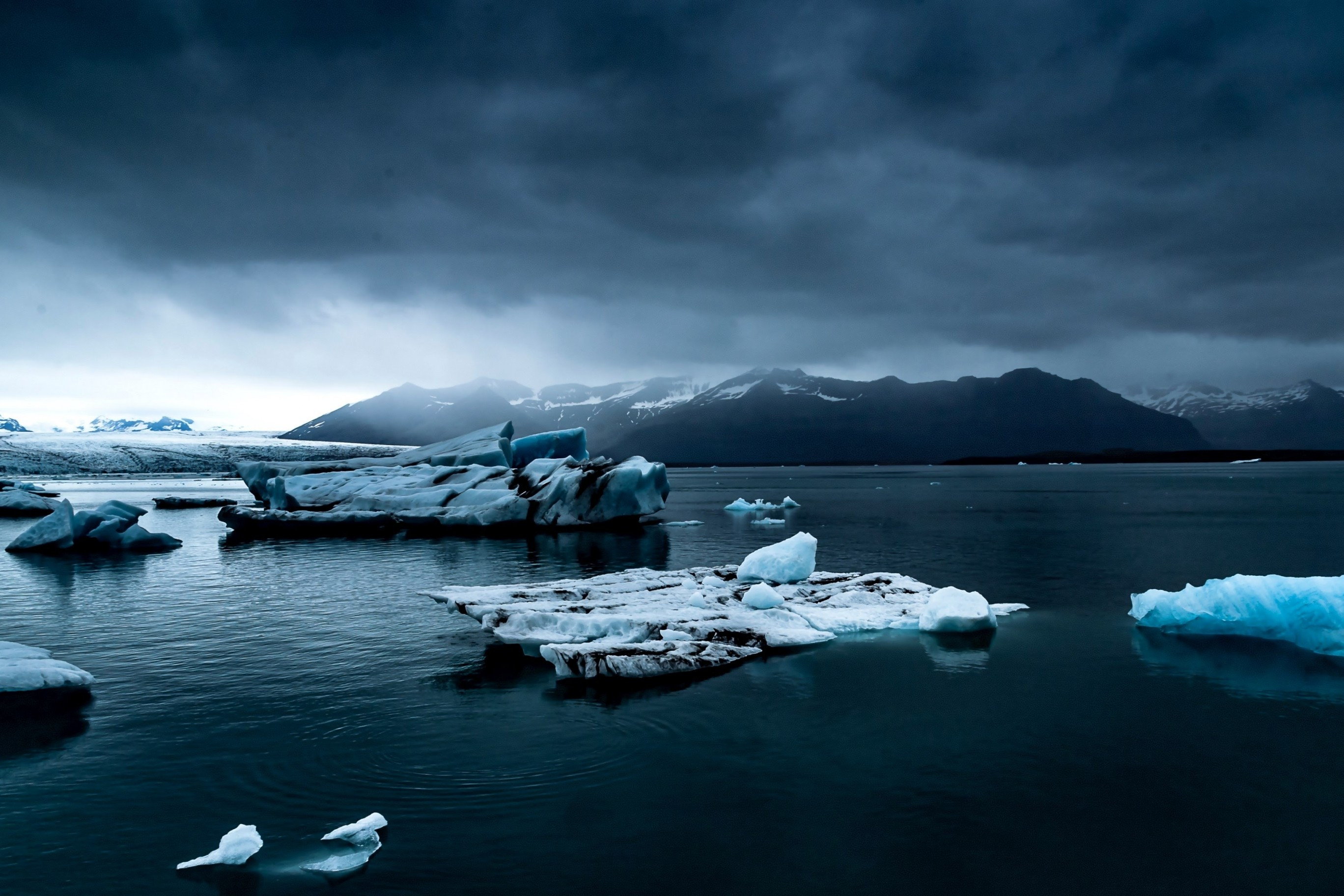 Download 2736x1824 Iceland, Iceberg, Dark Clouds Wallpaper