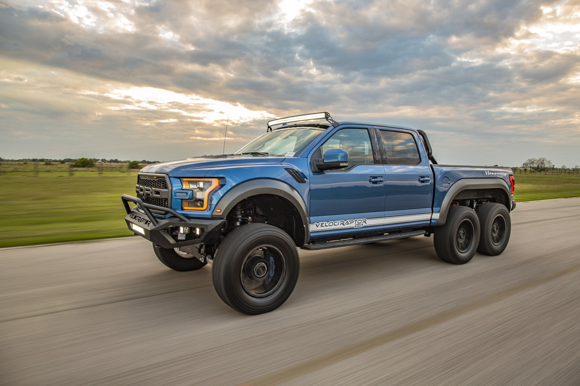 Hennessey VelociRaptor 6×6 In Ford Performance Blue with White Racing Stripes Photo