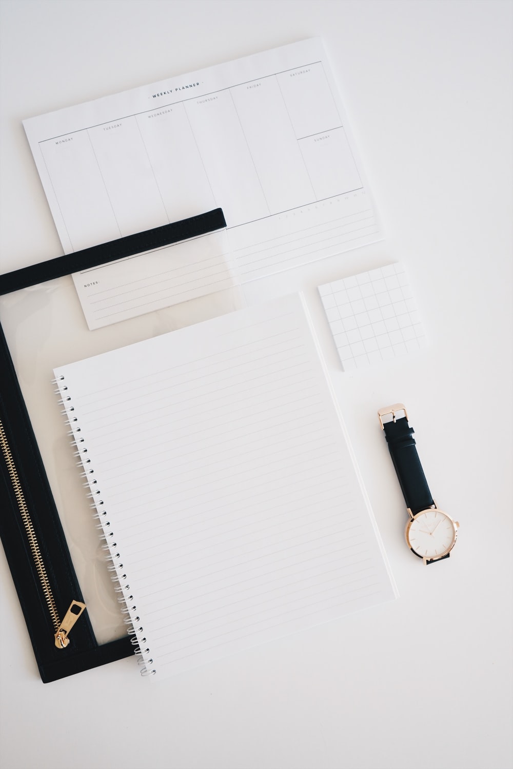 gray lined paper on table photo