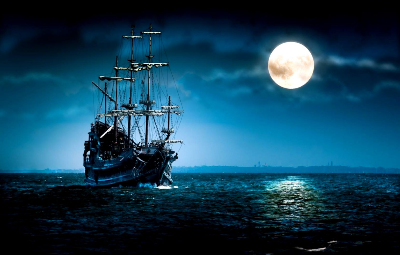 Blue Ocean Night Sky With Ship
