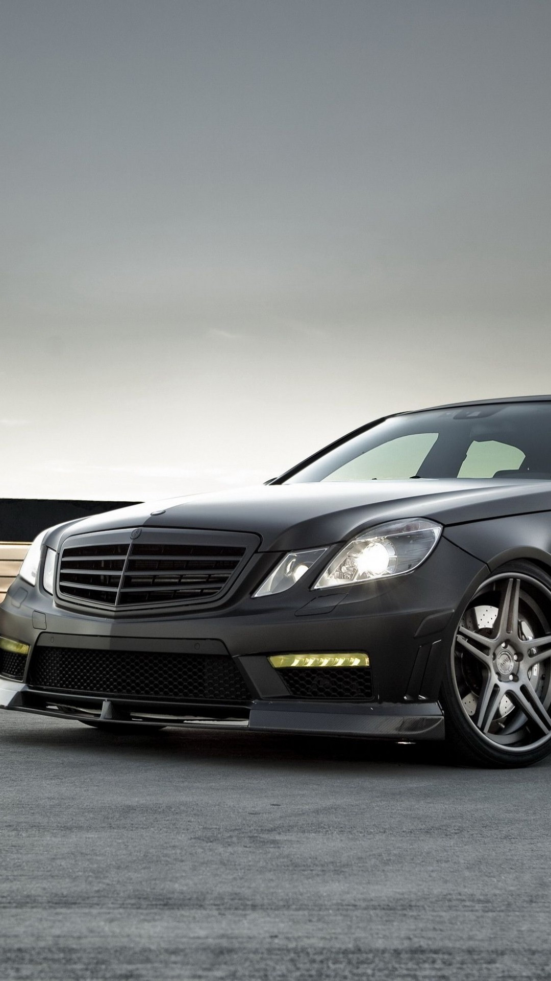 Download 1080x1920 Mercedes Benz E63 Amg, Side View, Luxury, Cars, Front View Wallpaper for iPhone 8, iPhone 7 Plus, iPhone 6+, Sony Xperia Z, HTC One