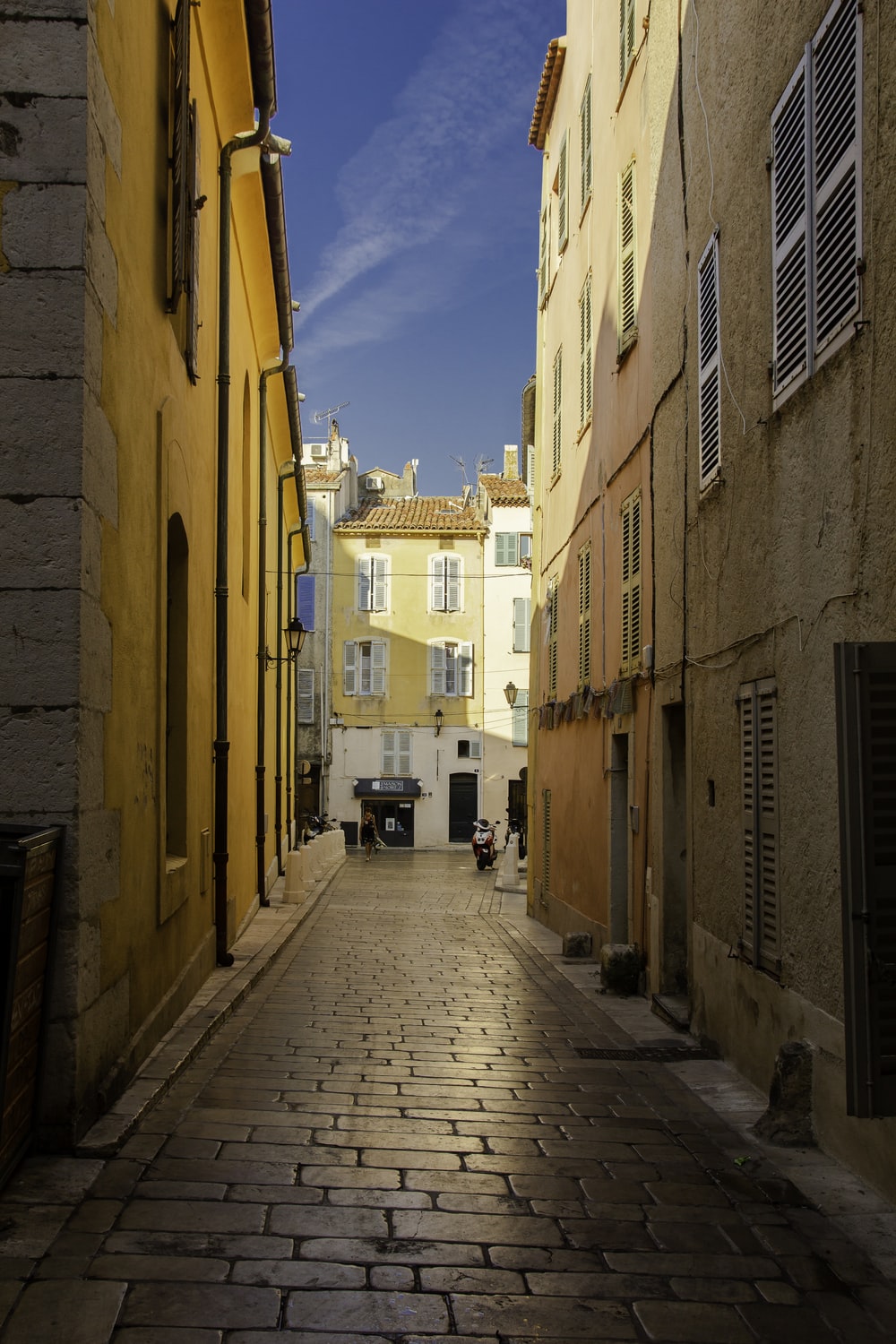 hallway between high rise buildings photo