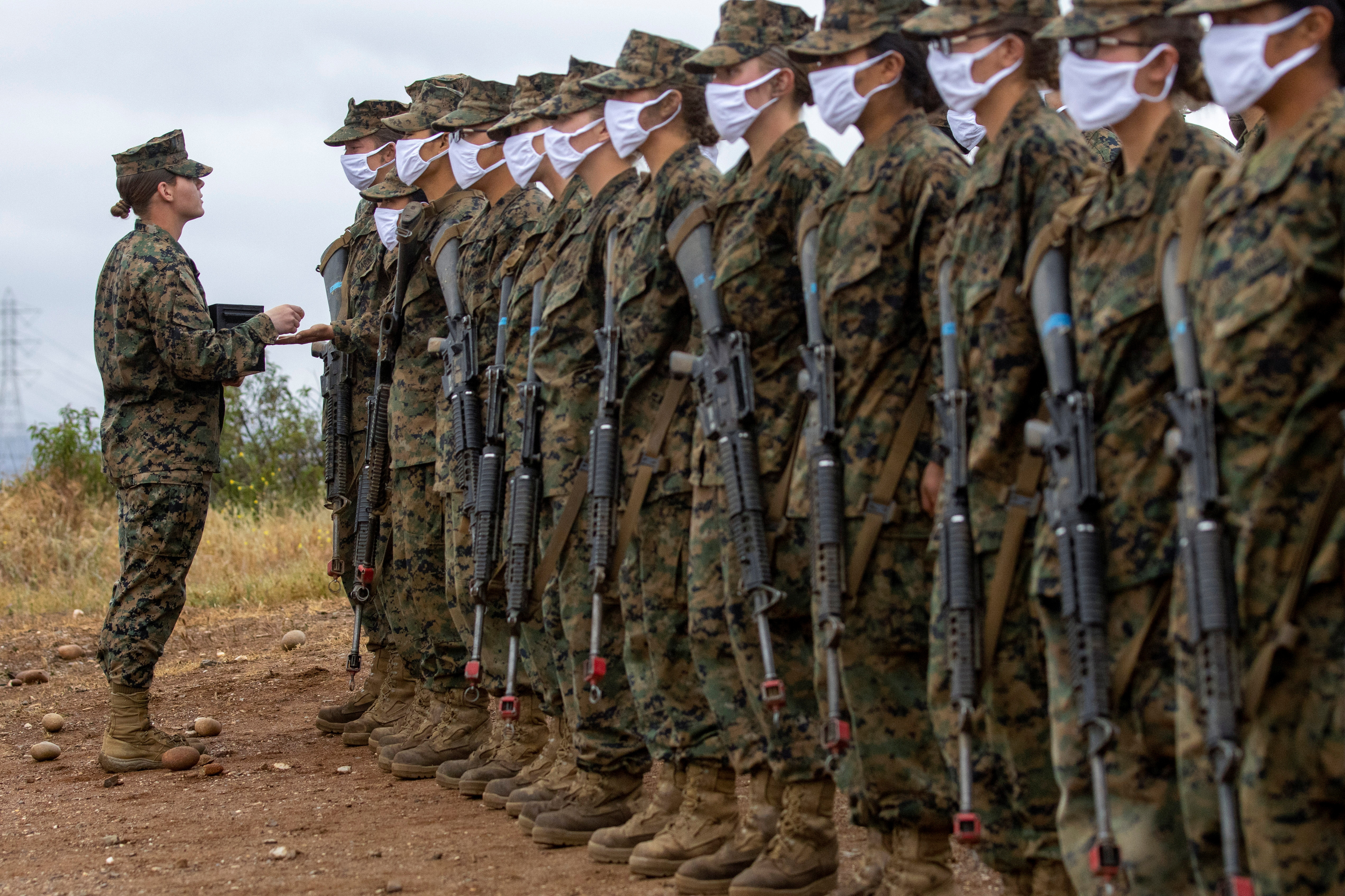 Breaking a barrier, women become U.S. Marines after surviving the 'crucible'