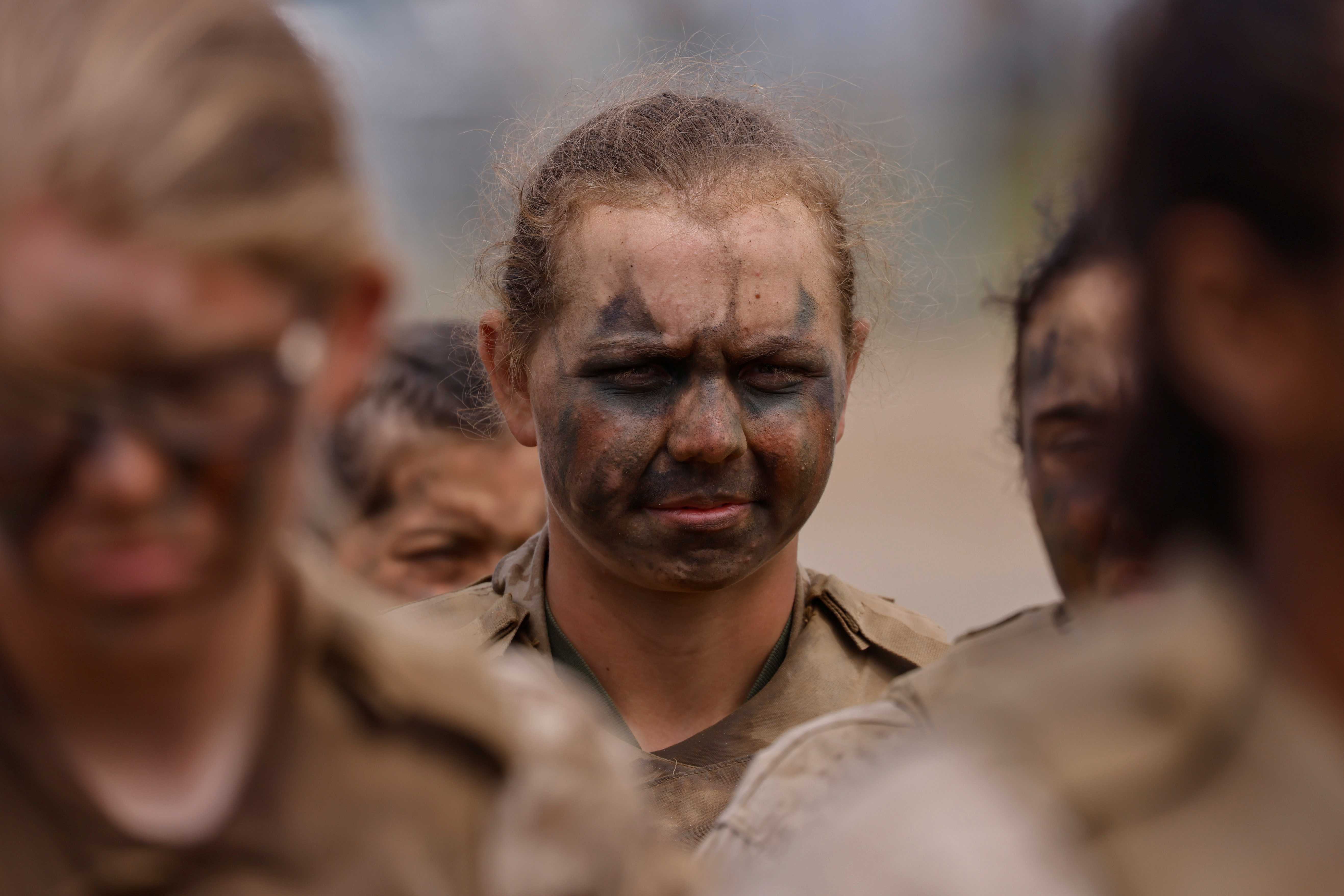 Breaking a barrier, women become U.S. Marines after surviving the 'crucible'