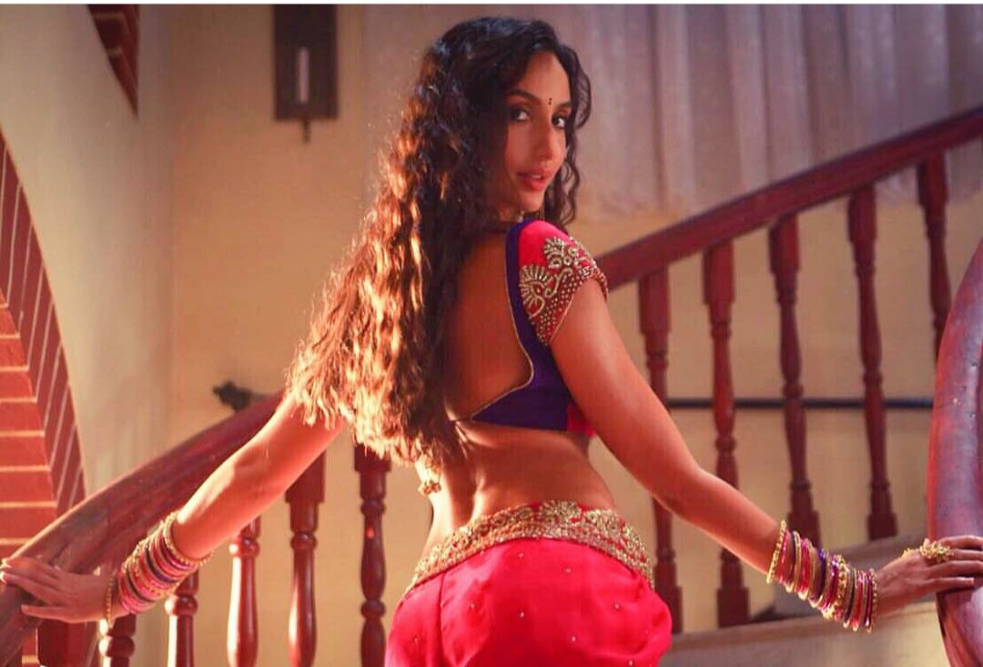 What are some sensuous picture of Nora Fatehi?