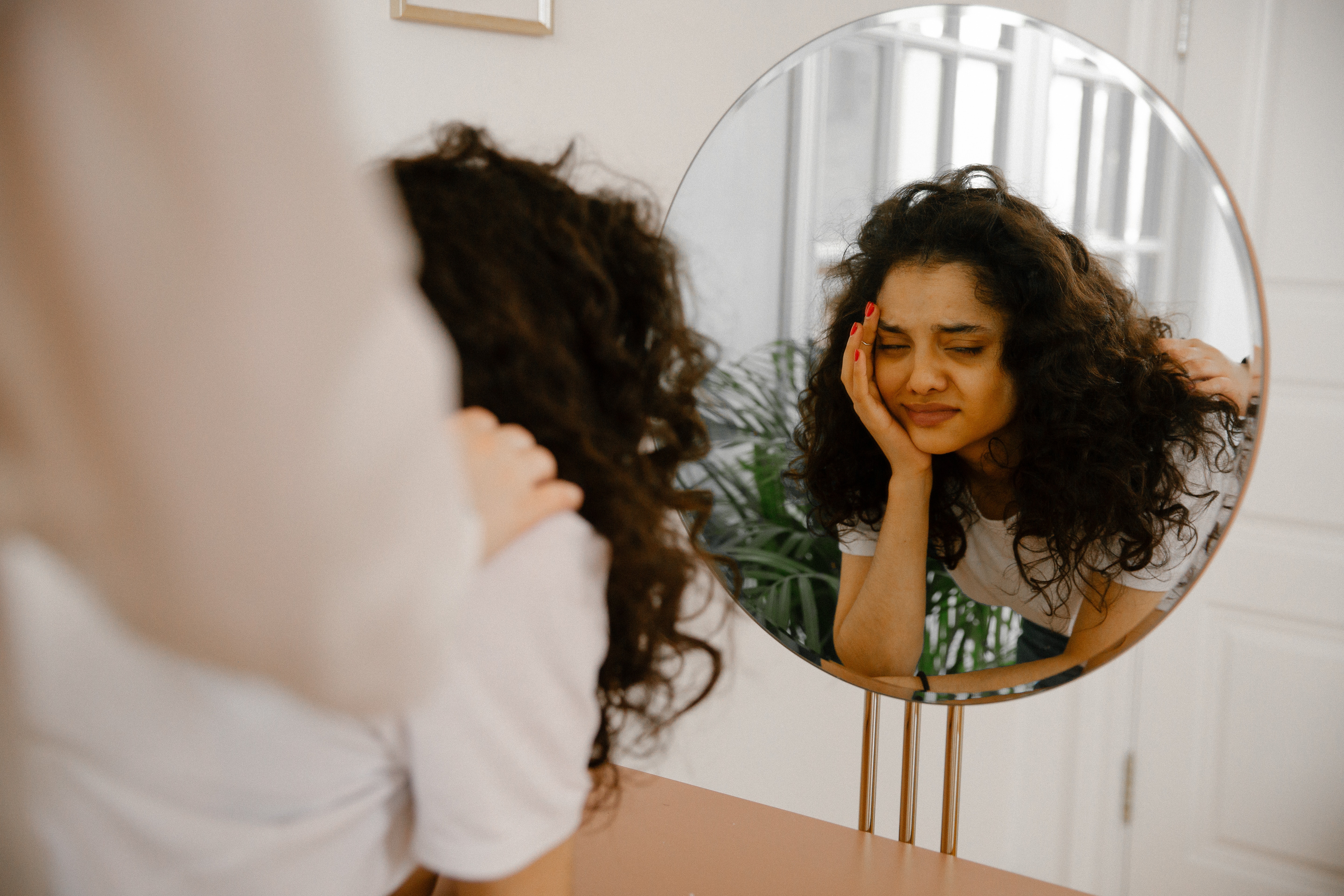 Reflection of Sad Woman in Mirror · Free