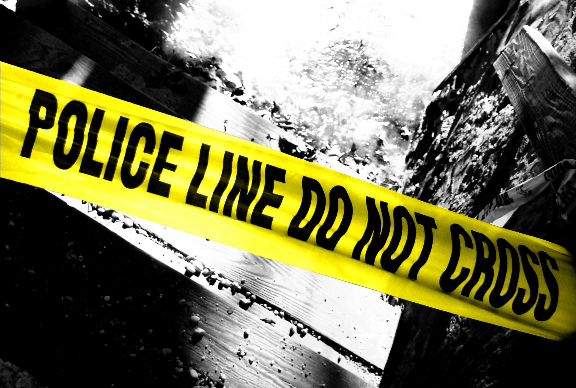Yellow police line - do not cross on concrete wall background with copy  space. Crime scene dark banner for true crime stories or investigations  podcast. Stock Photo | Adobe Stock