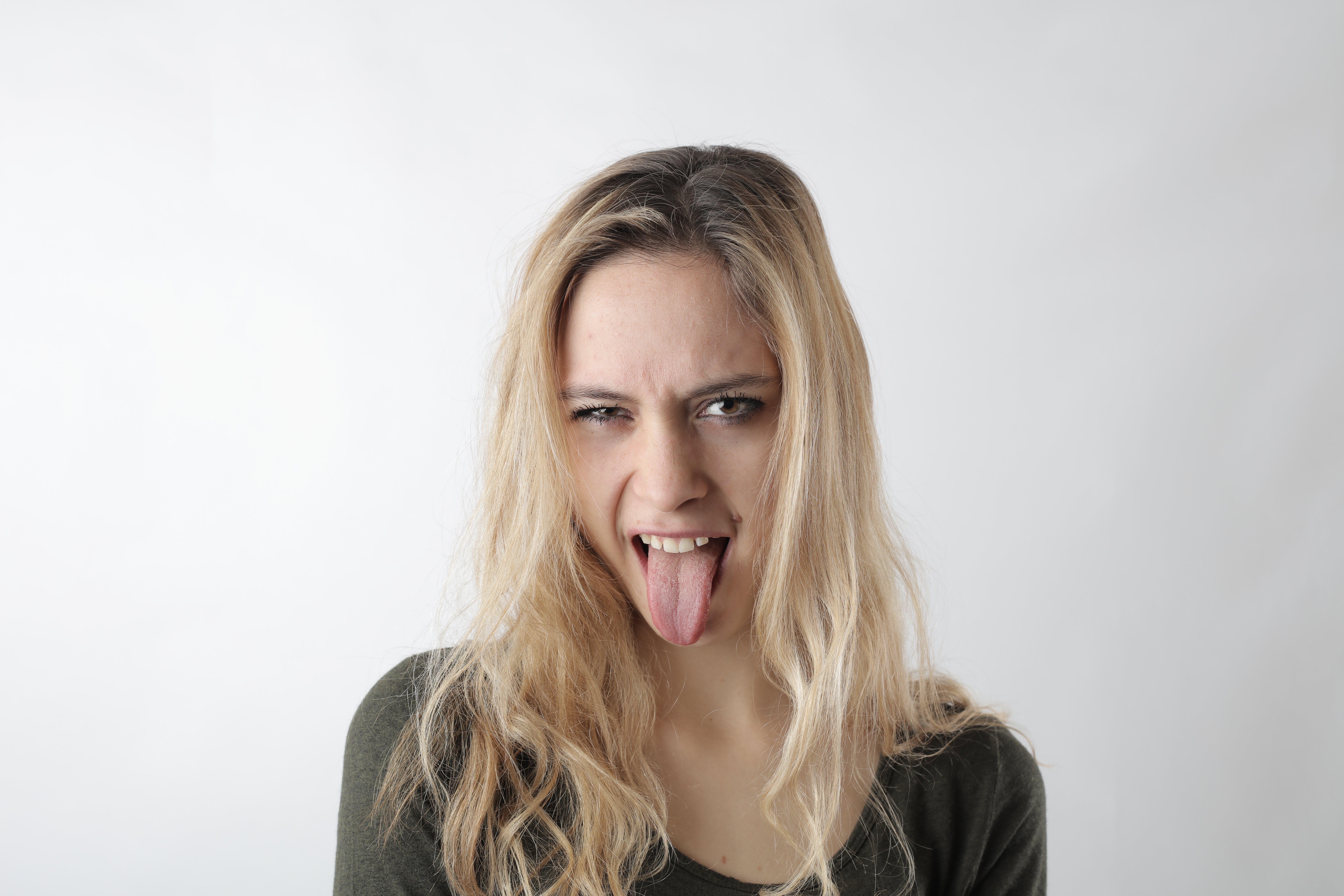 Woman Sticking Her Tongue Out · Free