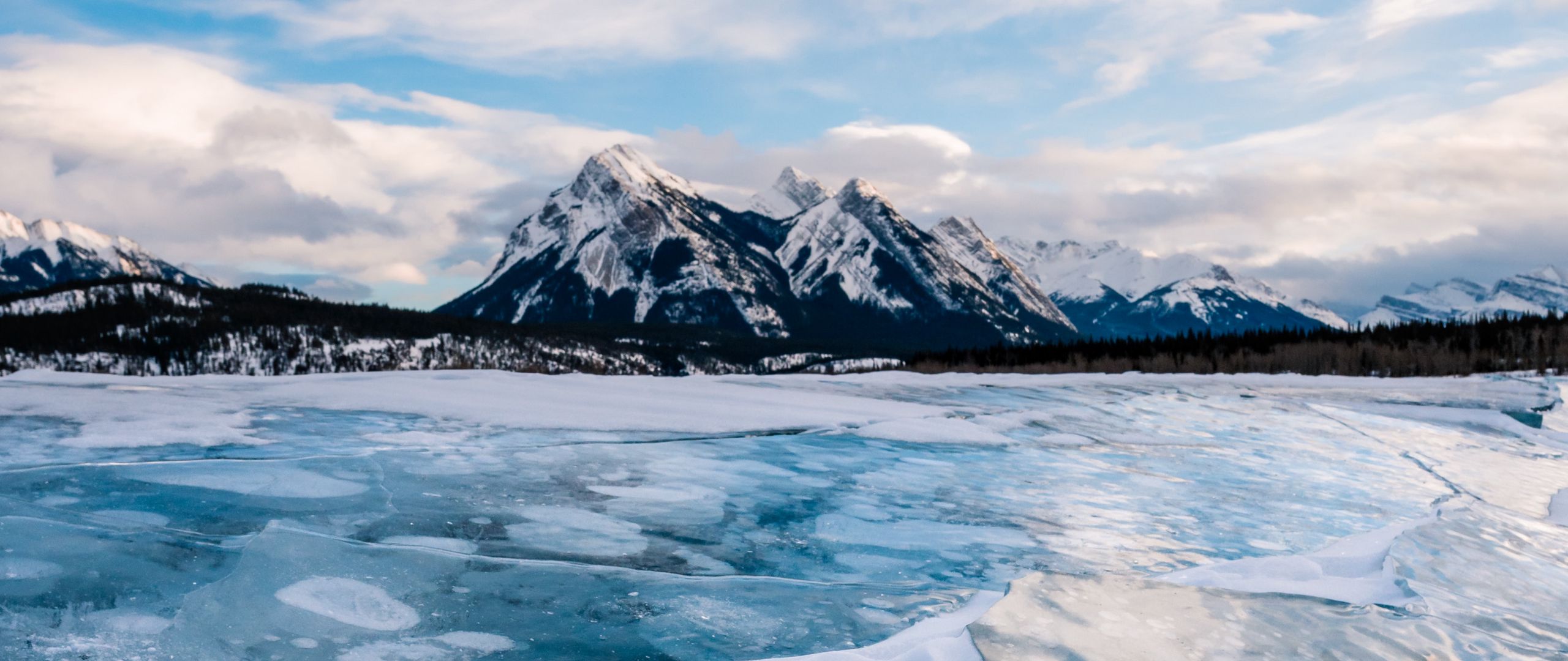 Download wallpaper 2560x1080 ice, lake, mountains, winter, landscape dual wide 1080p HD background