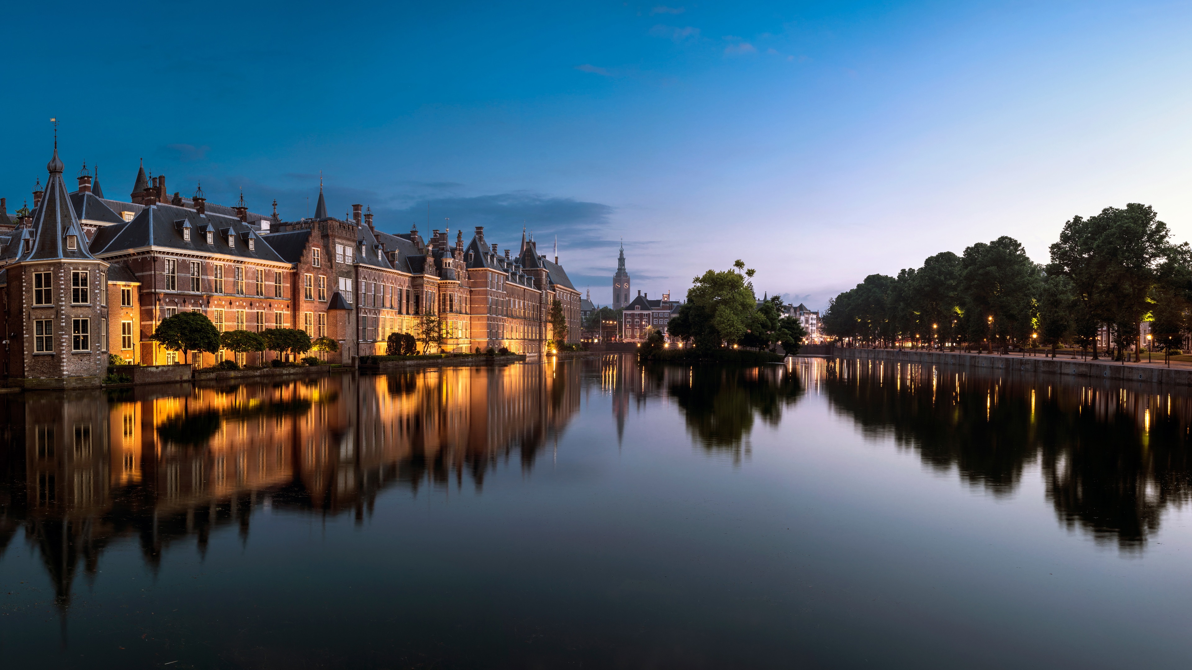 Wallpaper Hague, Netherlands, city, lake, buildings, trees, lights, dusk 3840x2160 UHD 4K Picture, Image