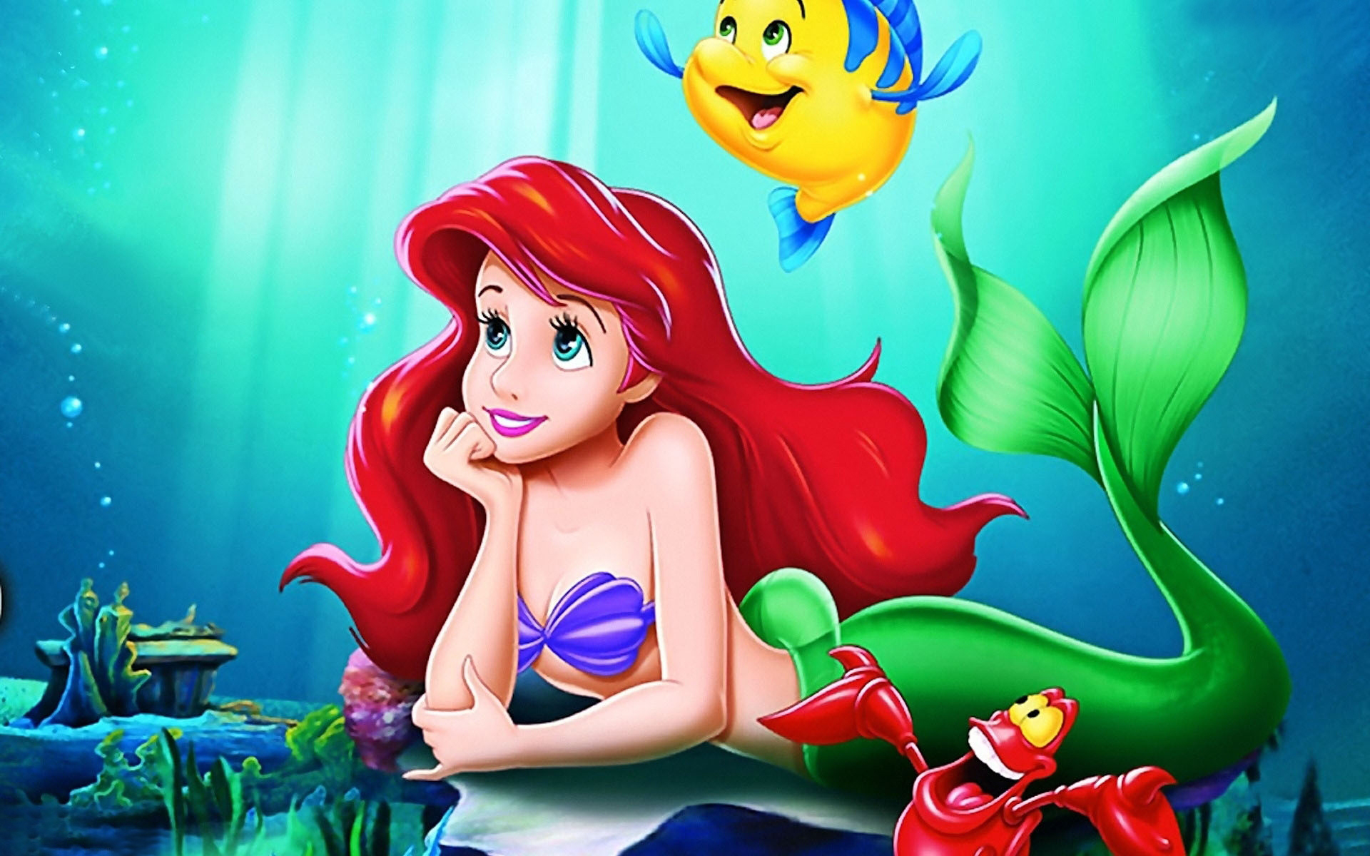 Little Mermaid and fish in the water