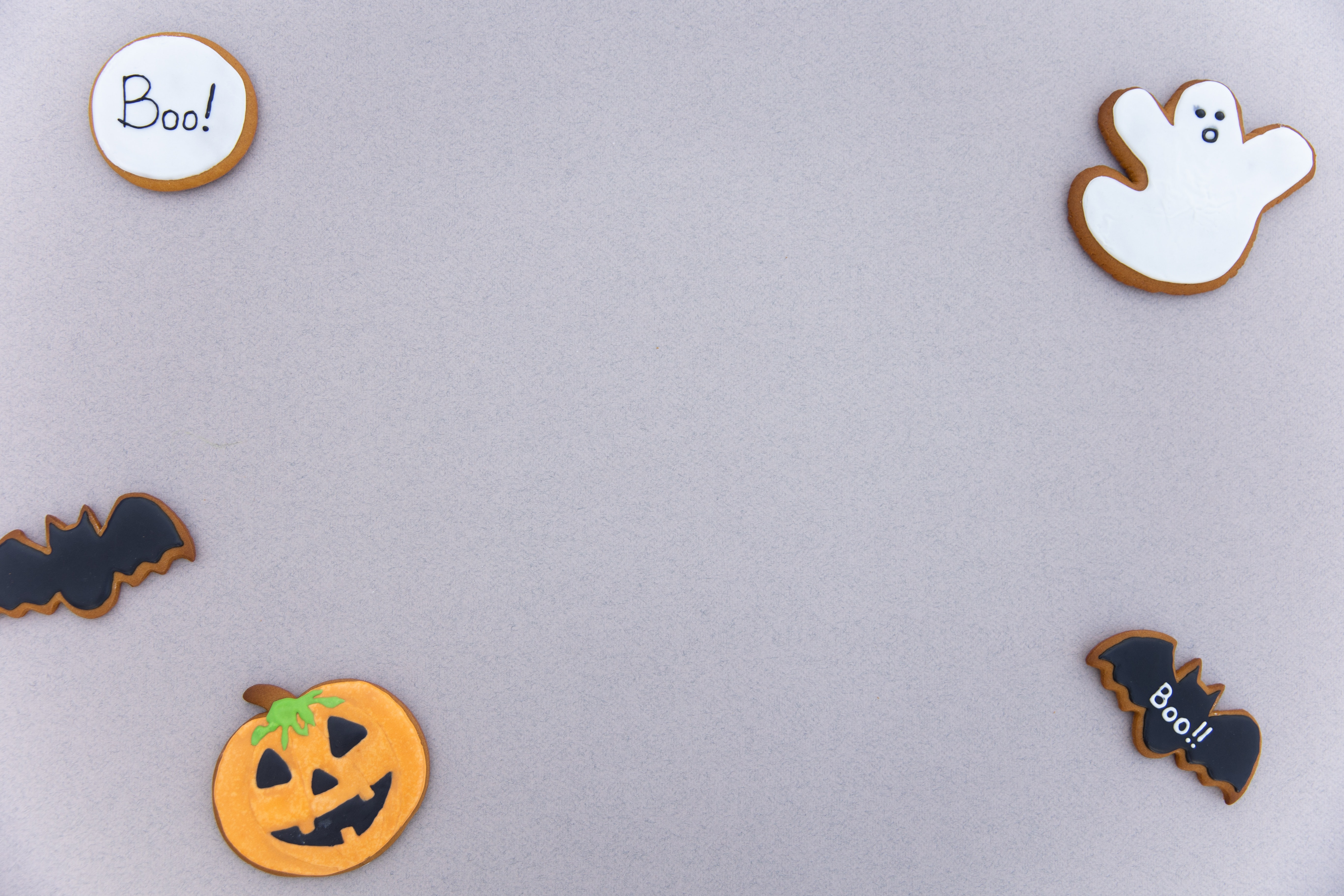 Various Halloween gingerbread cookies placed on gray background · Free