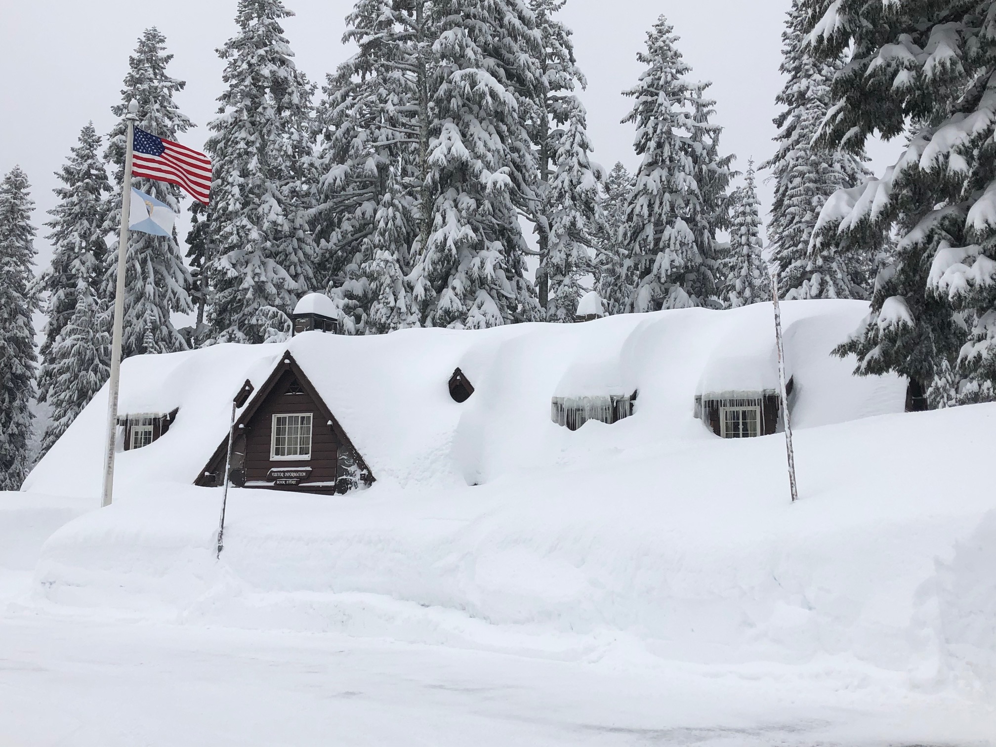 Crater Lake 'digging out' after being buried in feet of fresh snow