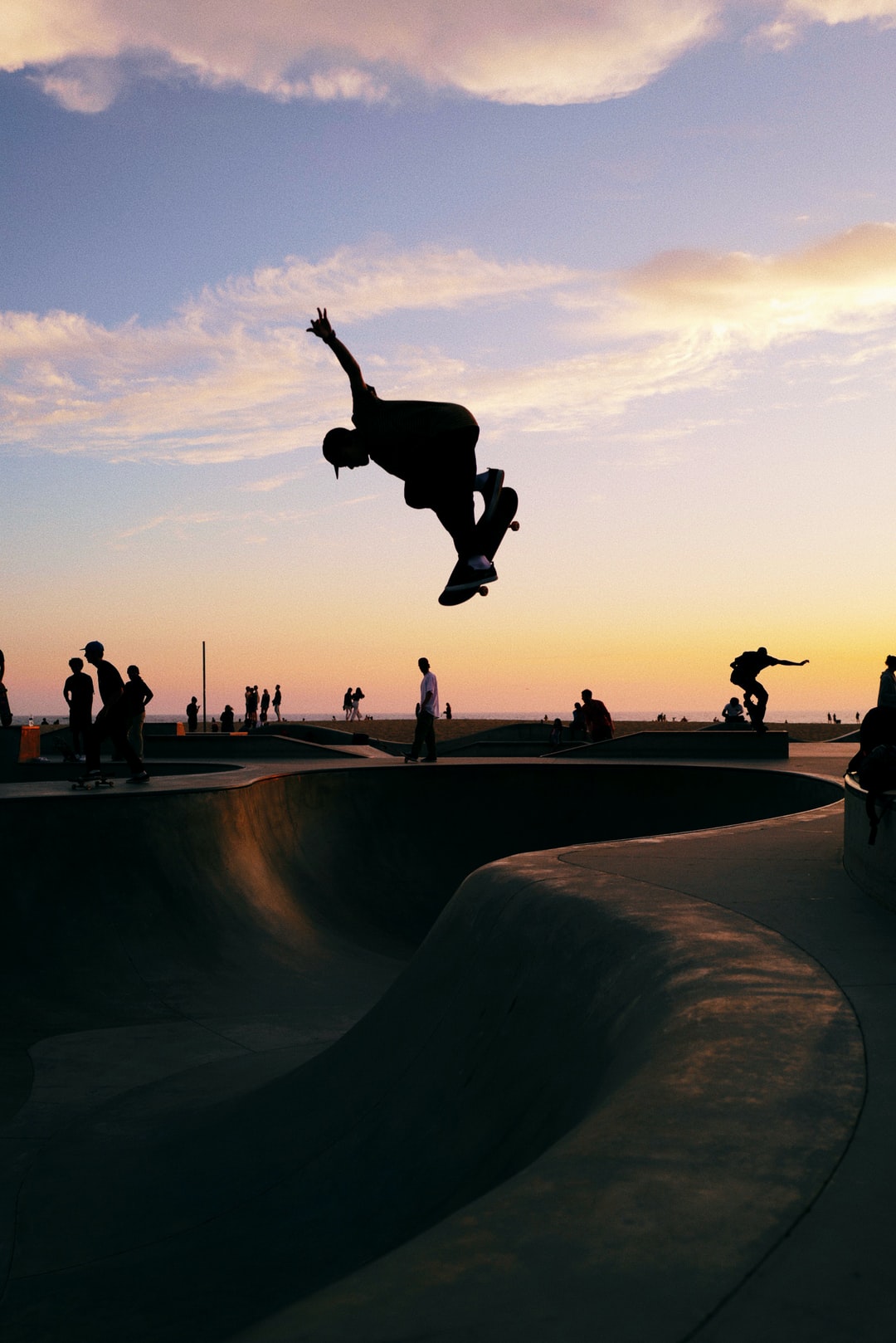 man in midair skateboarding photo