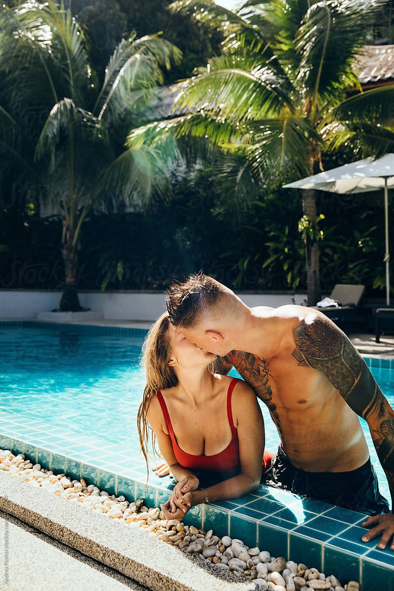 Young couple gently kissing by Andrey Pavlov for Stocksy United. Fotos de casais, Fotos de casais praia, Fotos fofas de casais