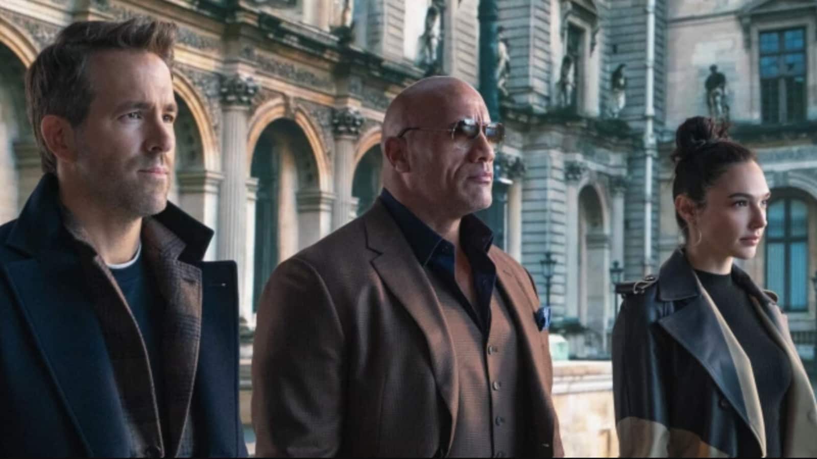 Red Notice movie review: Dwayne Johnson, Ryan Reynolds, Gal Gadot have made Race 4 with ₹1480 crore