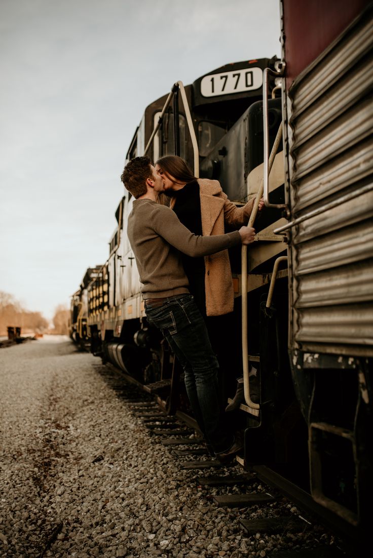 Riley ╳ Andrew Wild lovers boarding trains. Michaela Maureen Photography. Photographer, Indiana wedding, Travel couple