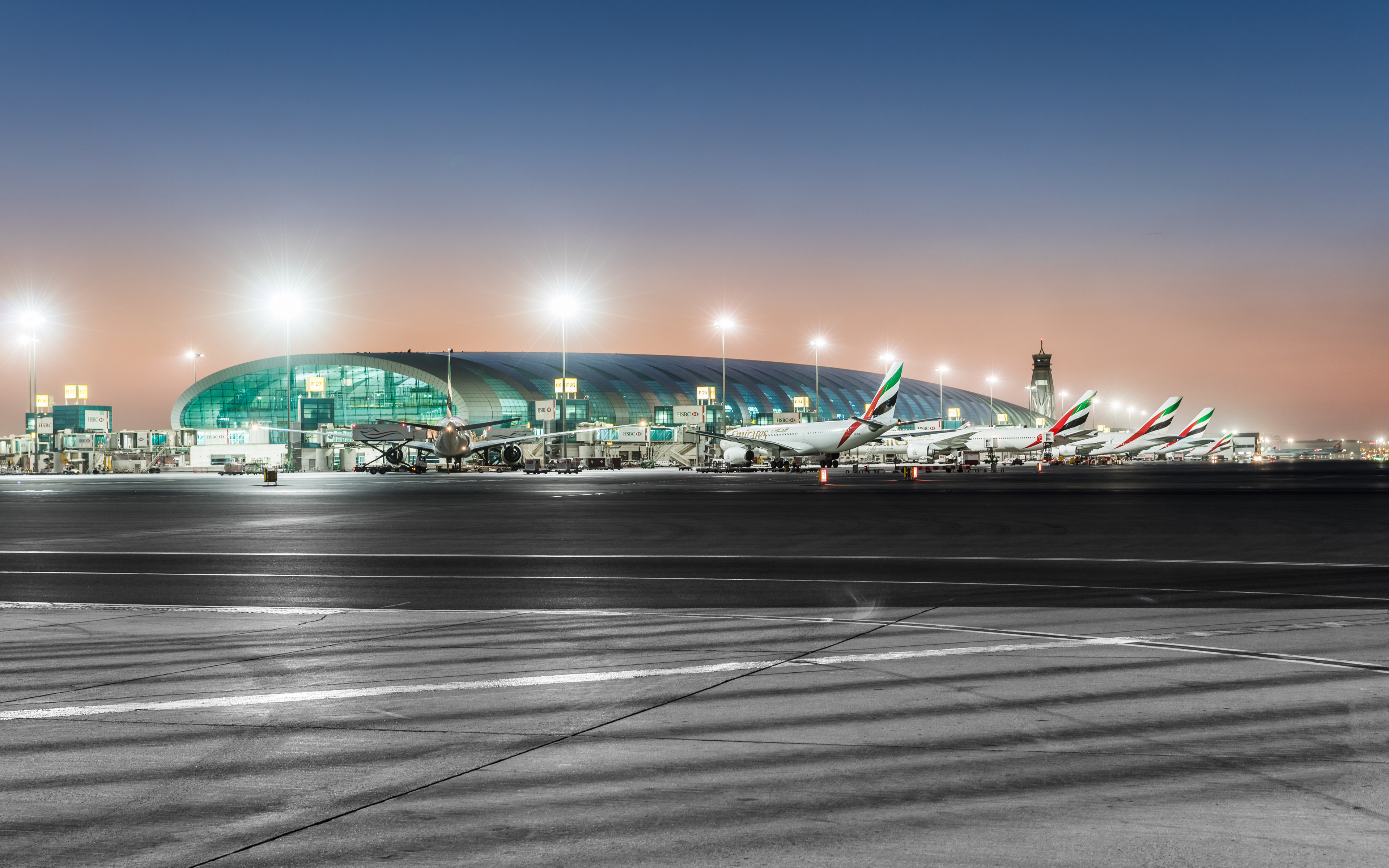 Download wallpaper Dubai International Airport, 4k, night, passenger aircraft, Dubai, UAE for desktop with resolution 3840x2400. High Quality HD picture wallpaper