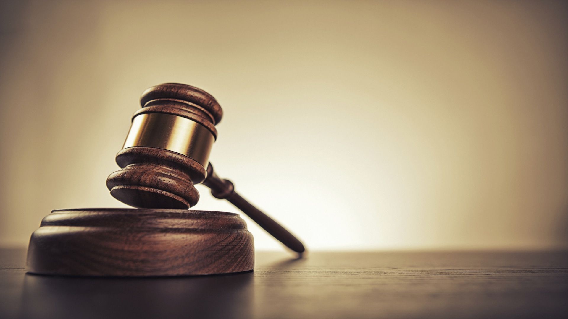 Close Up Studio Shot Of Judges Hand With Gavel High-Res Stock Photo - Getty  Images