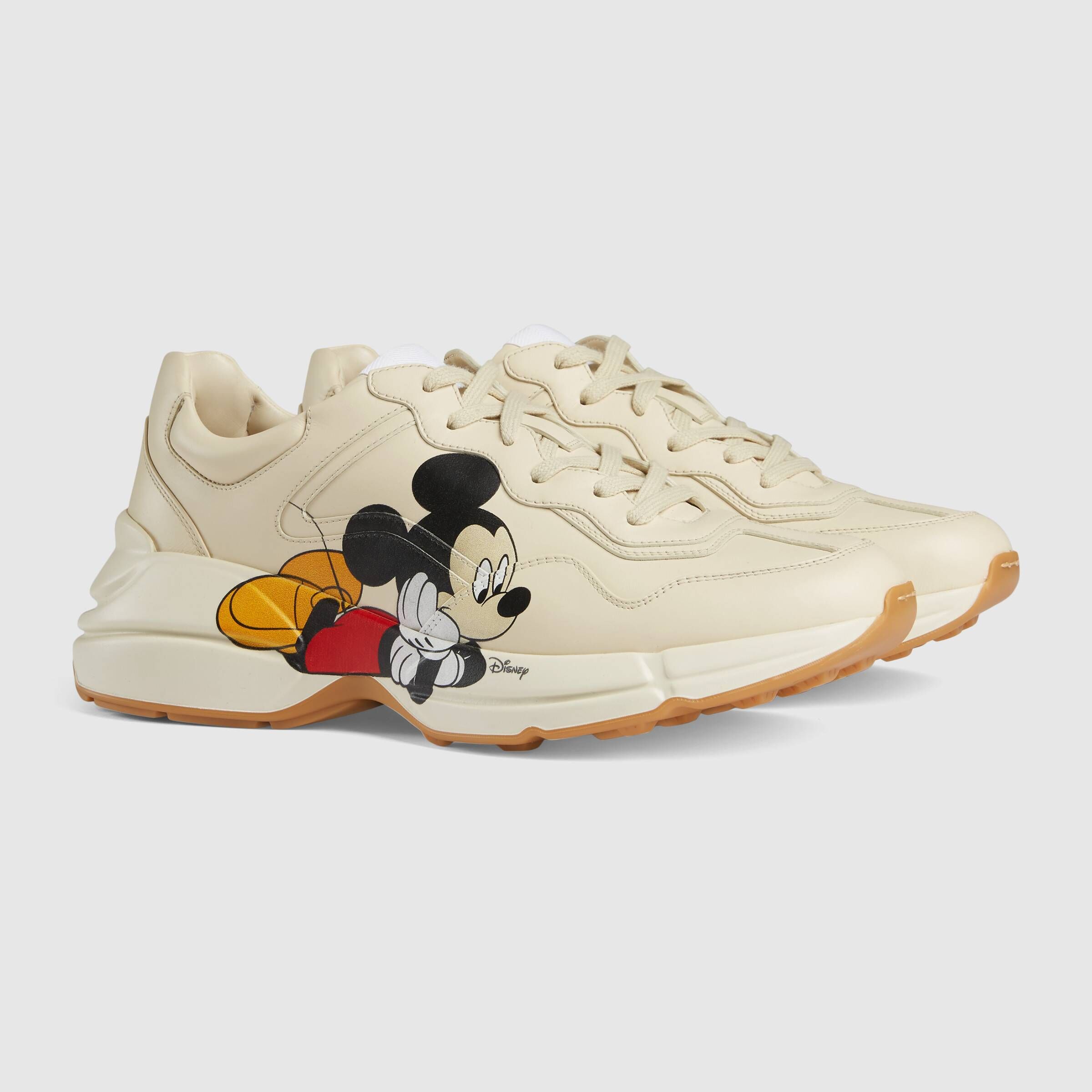 Gucci's Disney x Gucci Rhyton sneaker. Mickey mouse shoes, Sneakers, Gucci men