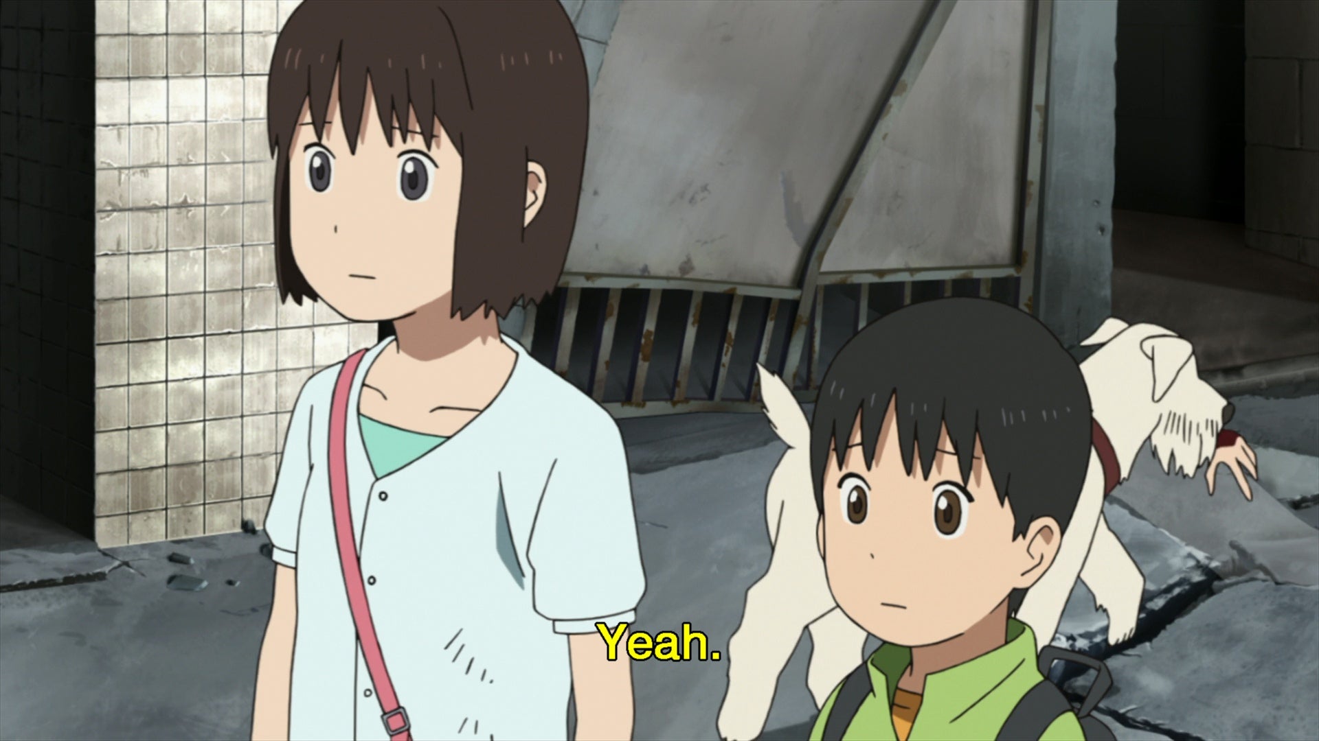 A dog carrying a torn off human hand in Tokyo Magnitude 8.0. There wasn't any explanation of that although it's fits the picture of Tokyo destroyed by major earthquake which caused lots