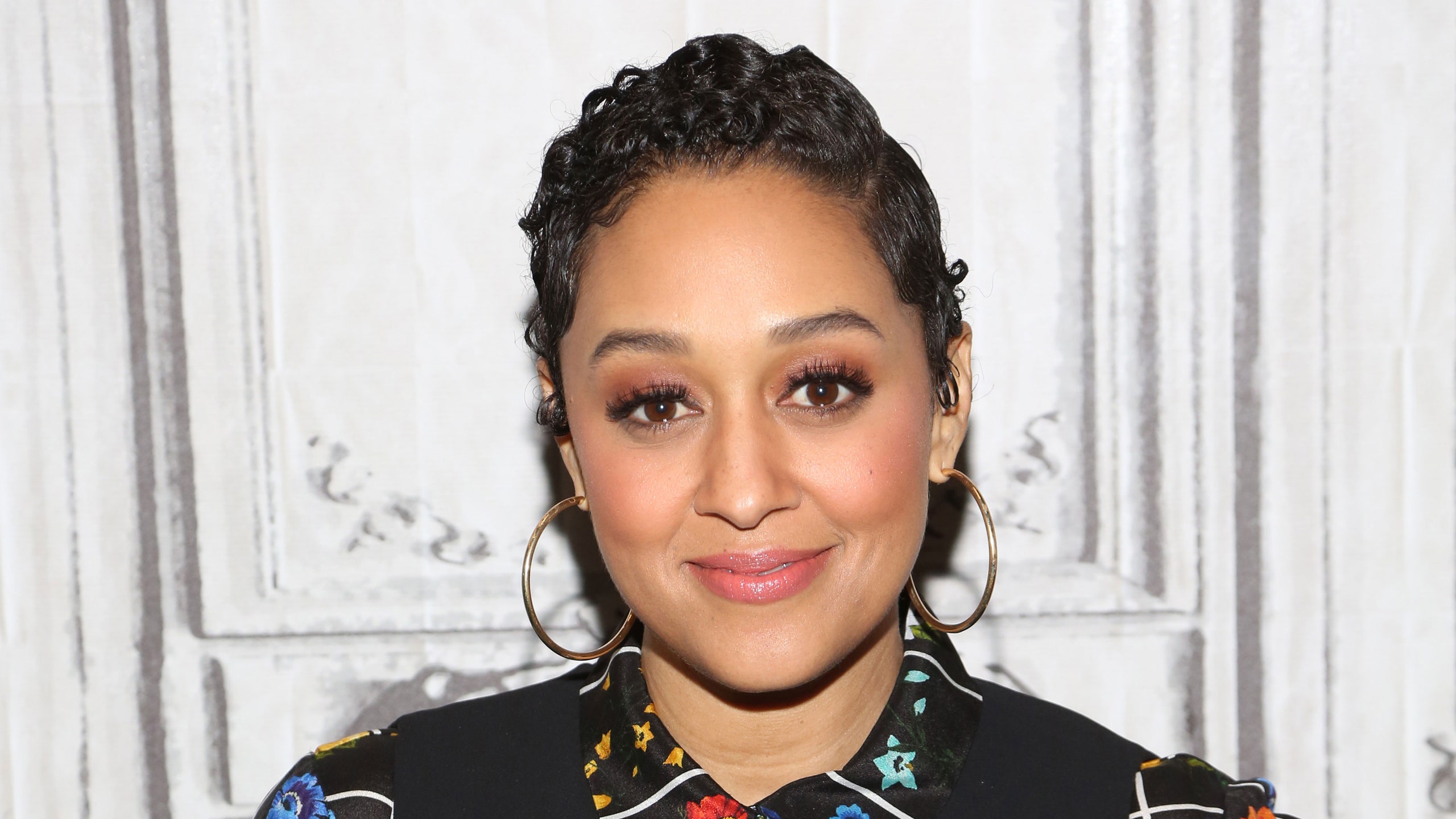 Tia Mowry Shared a Throwback Photo of Herself Wearing a Side Ponytail