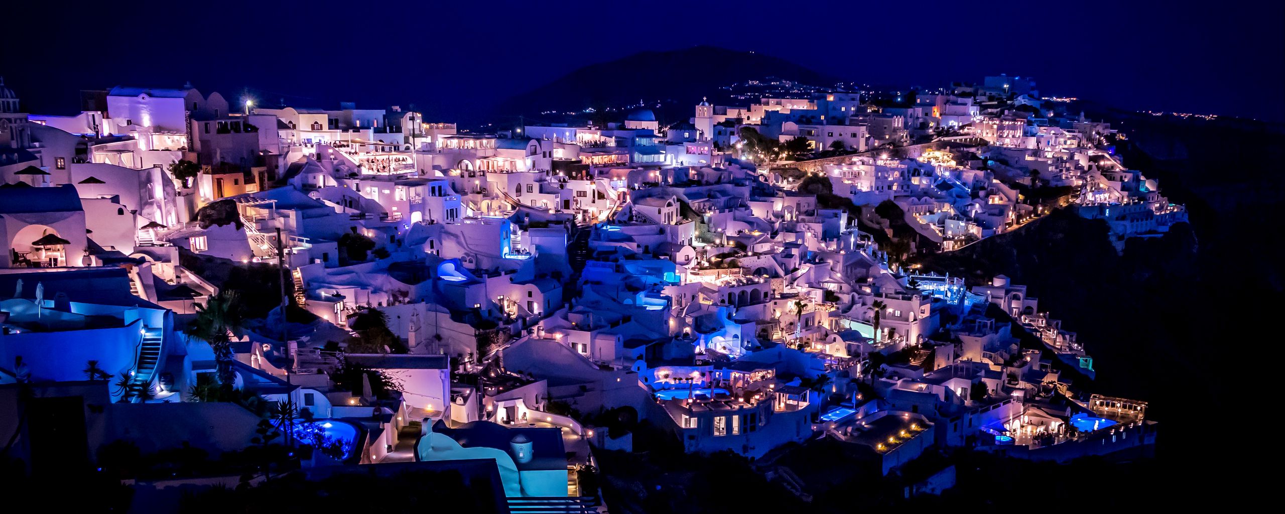 Download wallpaper 2560x1024 santorini, greece, night city, lighting ultrawide monitor HD background