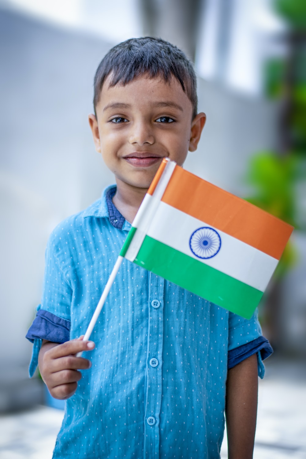 boy holding India flag photo