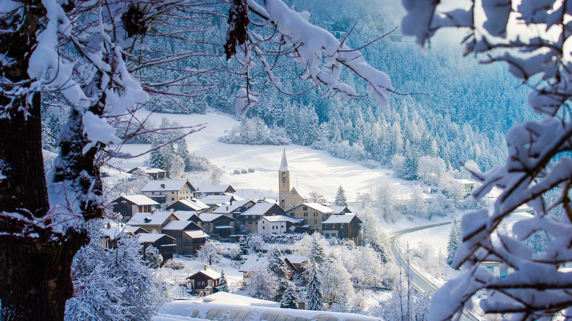 The small town of Filisur with snow in winter, Switzerland. Windows 10 Spotlight Image