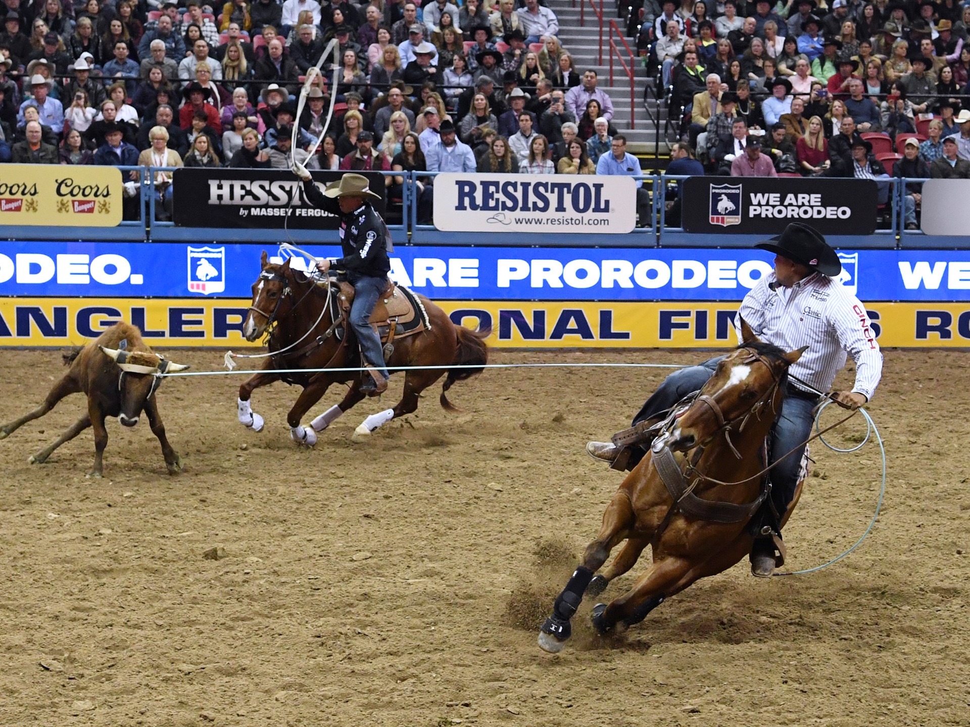 Erich Rogers and Clint Summers compete in team roping