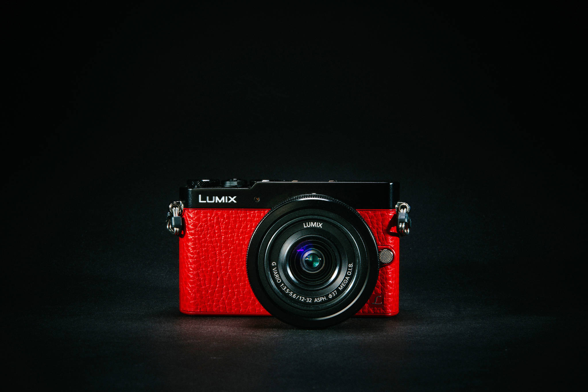 Black Digital Camera on Red Background  Free Stock Photo