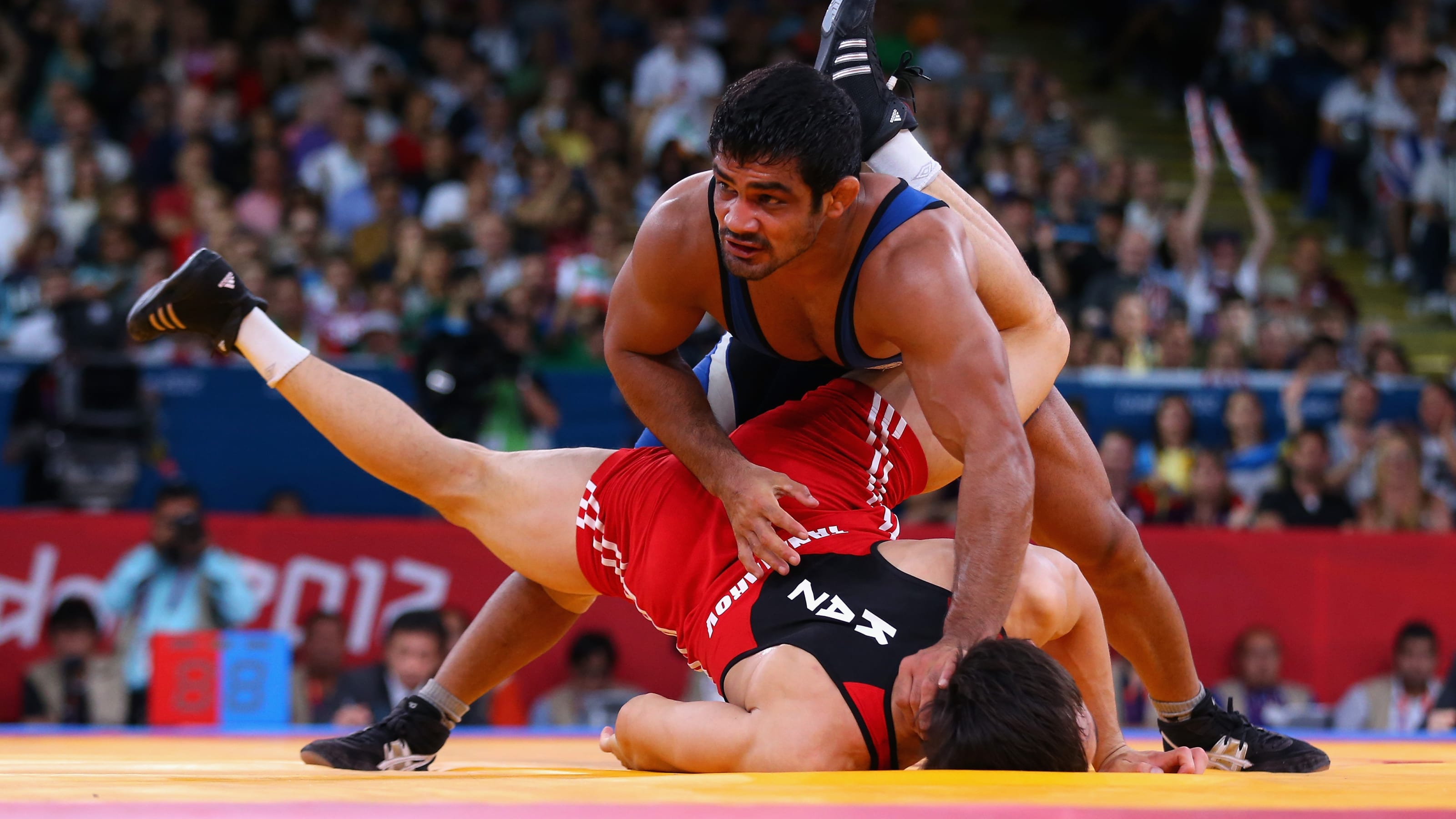 Sushil Kumar has burning desire to win Olympic gold: Satpal Singh