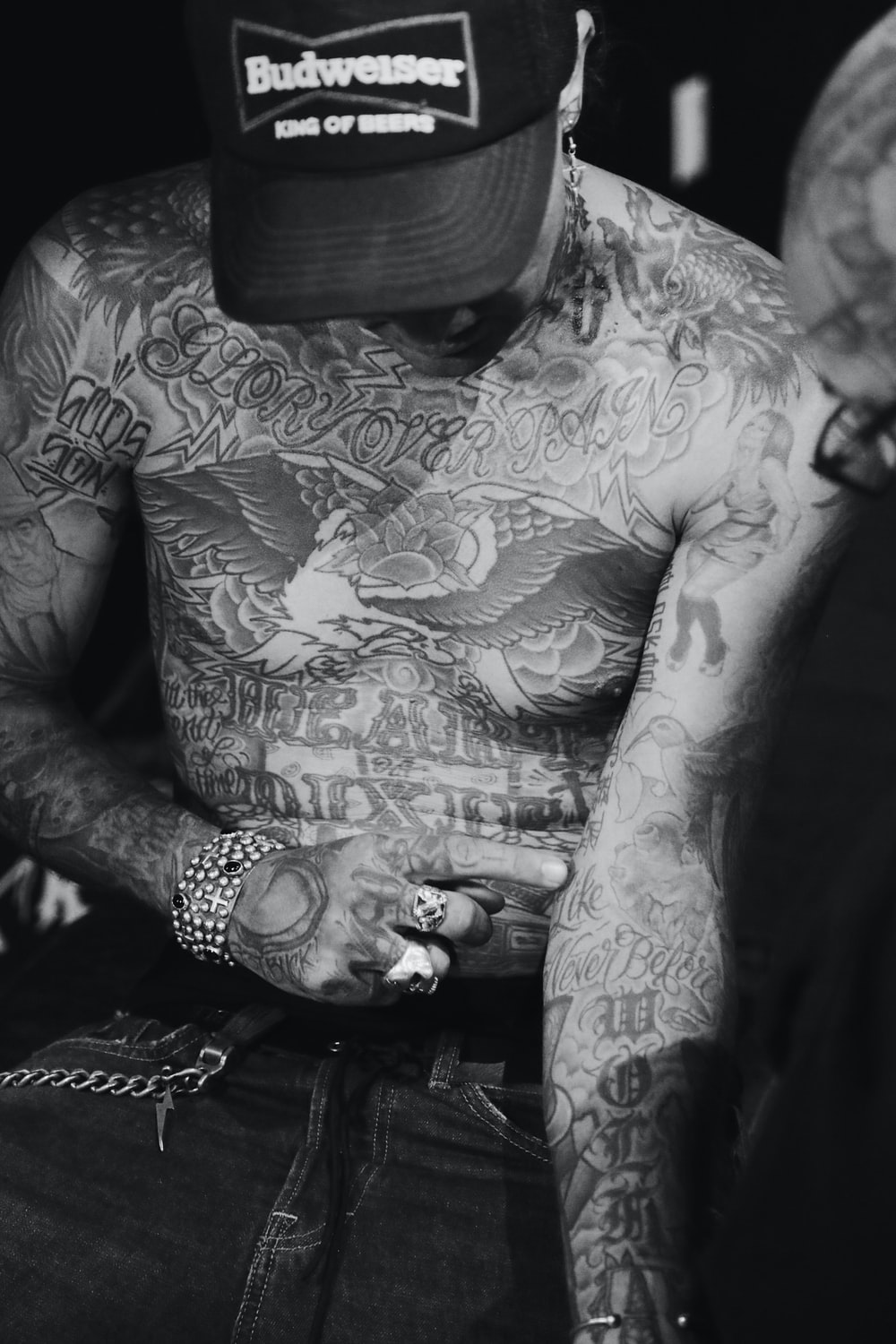 man with assorted body tattoo photo