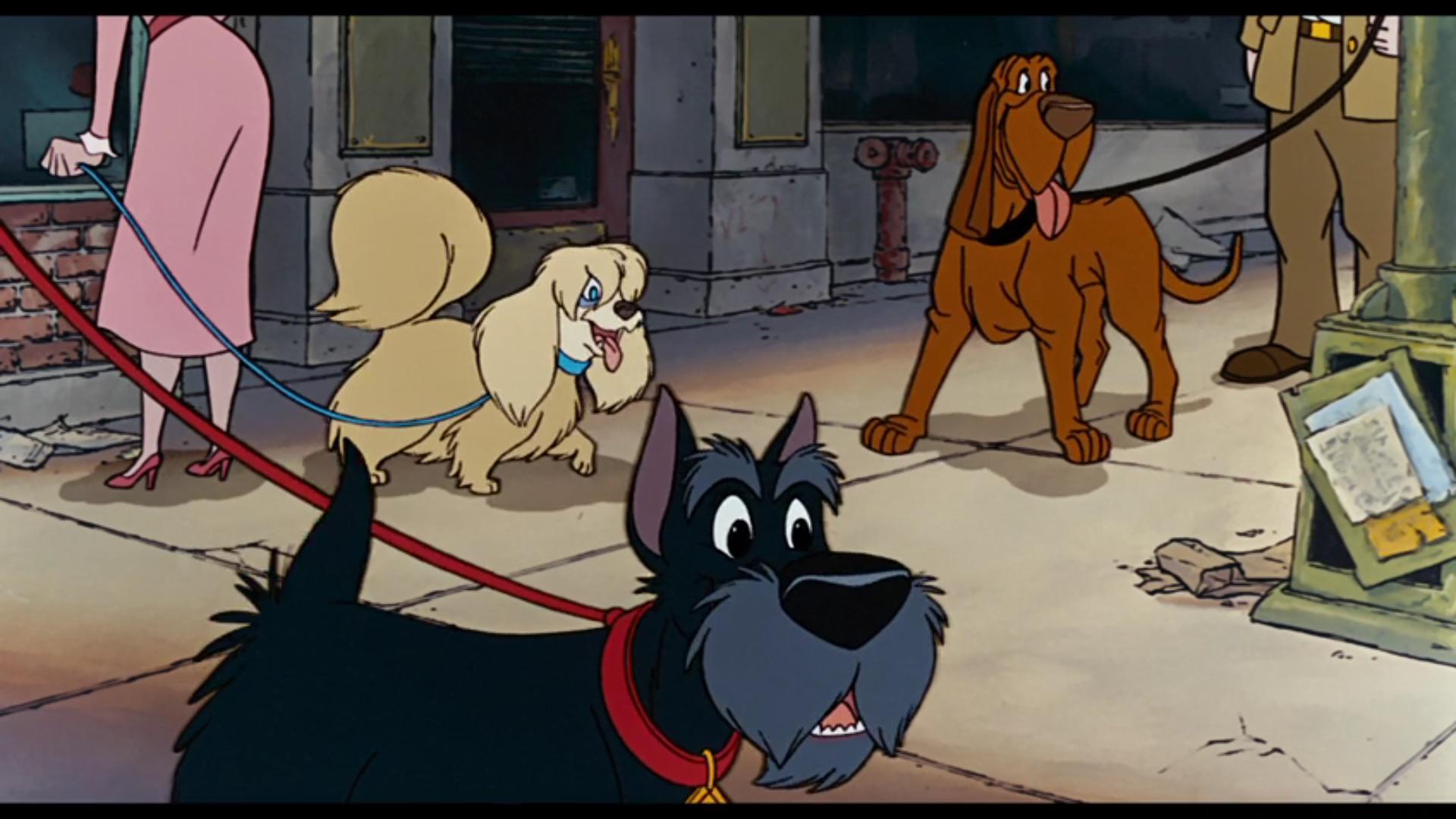 In Disney's Oliver & Company (1988), shortly after the two meet, Dodger is singing and leading Oliver through New York. For a second you can see Jock, Trusty and Peg from Disney's