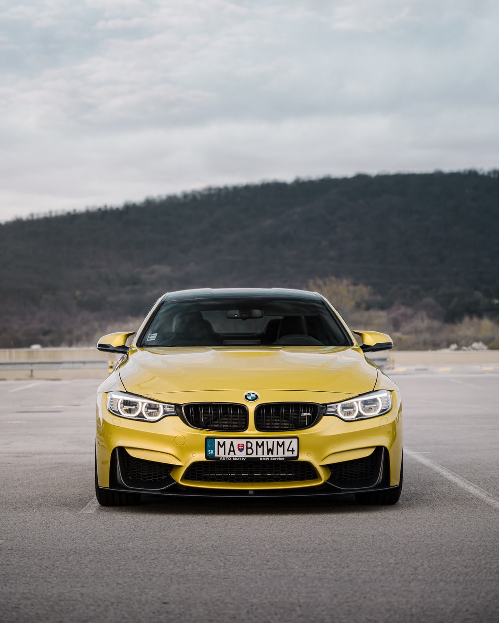 yellow BMW car photo