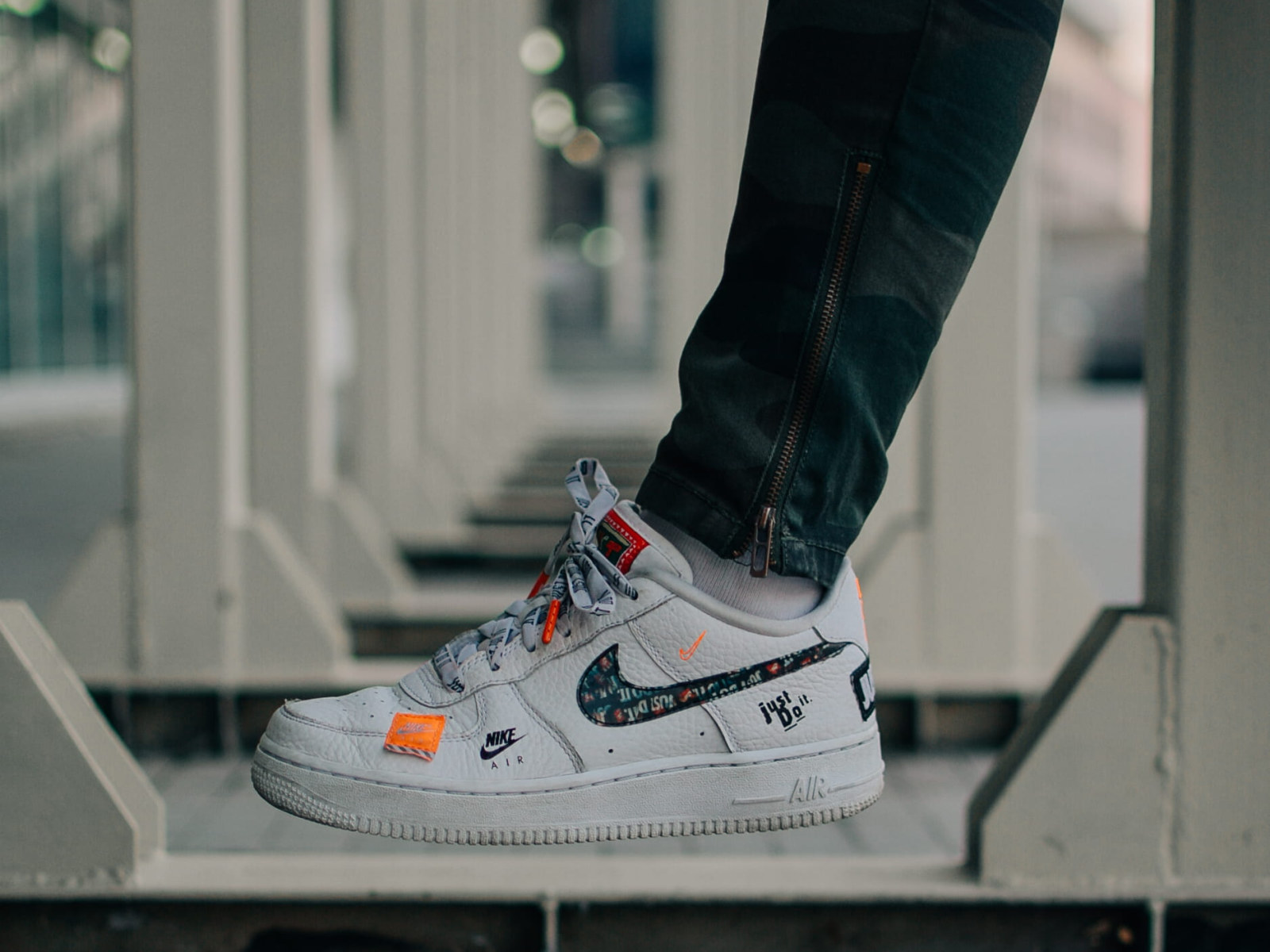 Wallpapers Selective Focus Photography Of Person Wearing Nike Air Force 1 Low Top Shoe • Wallpapers For You HD Wallpapers For Desktop & Mobile
