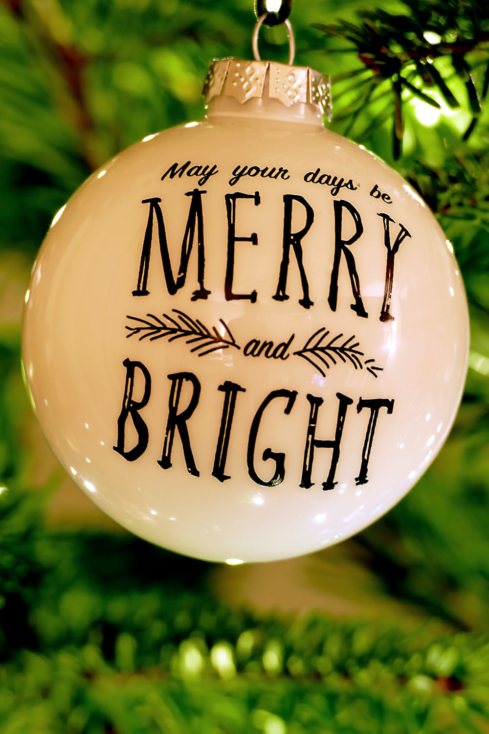 white and black Merry Bright Christmas bauble photo
