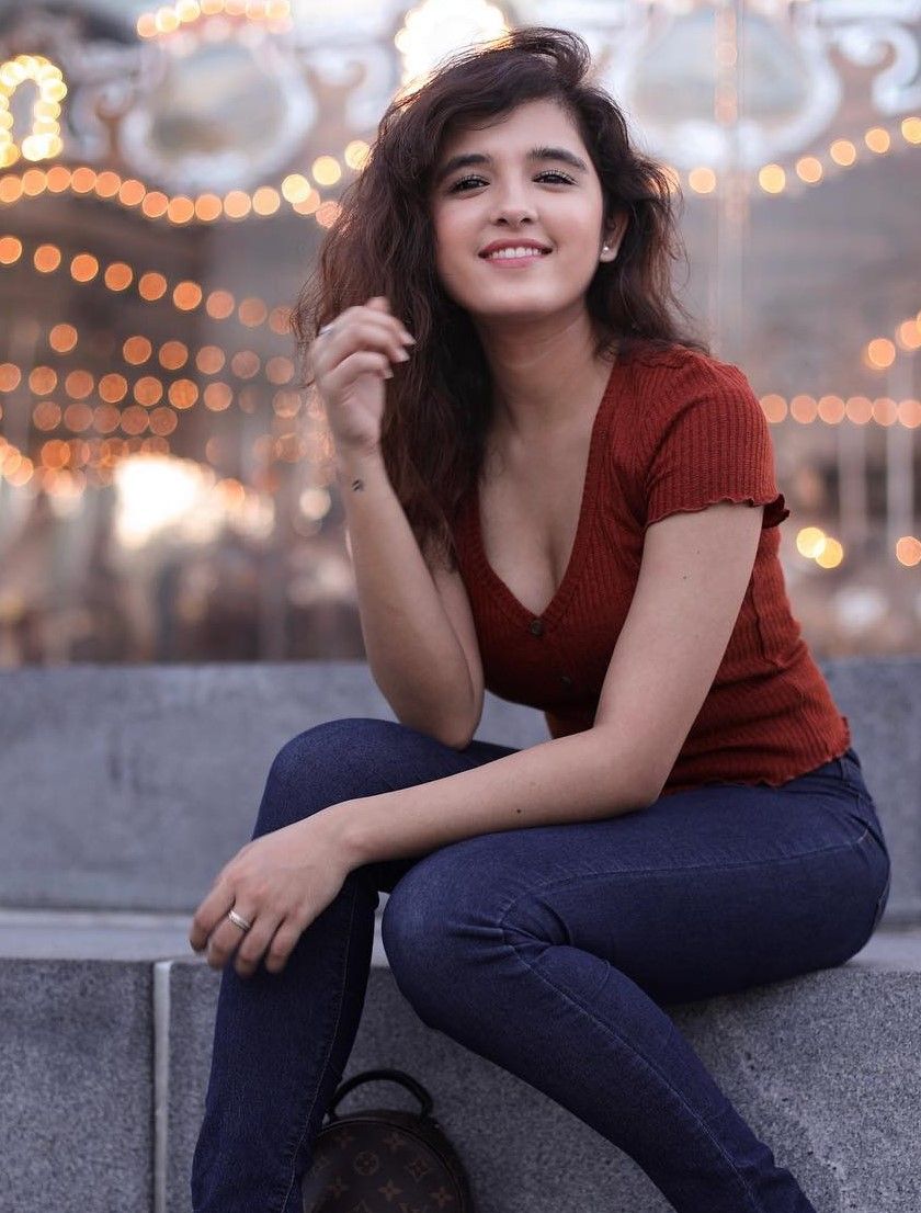 shirley setia HD wallpaper, clothing, beauty, photo shoot, sitting, long hair, photography, jeans, fashion, leg, model