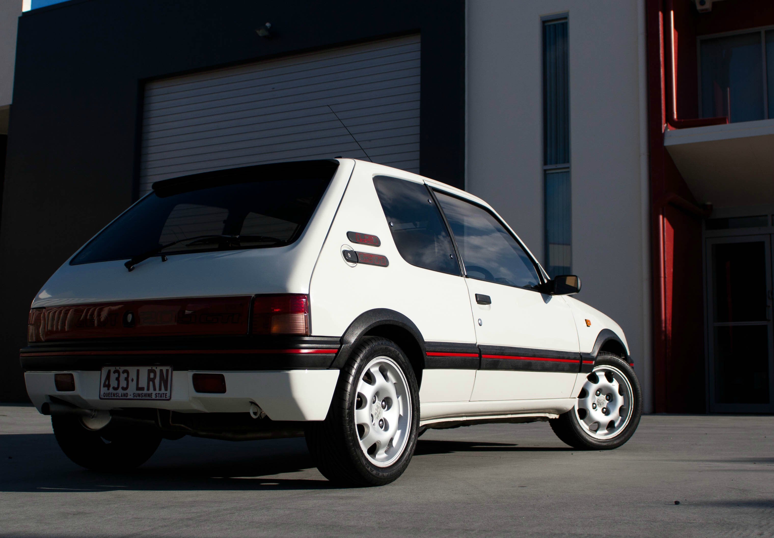 My old Peugeot 205 GTI. Raw, 80's fun