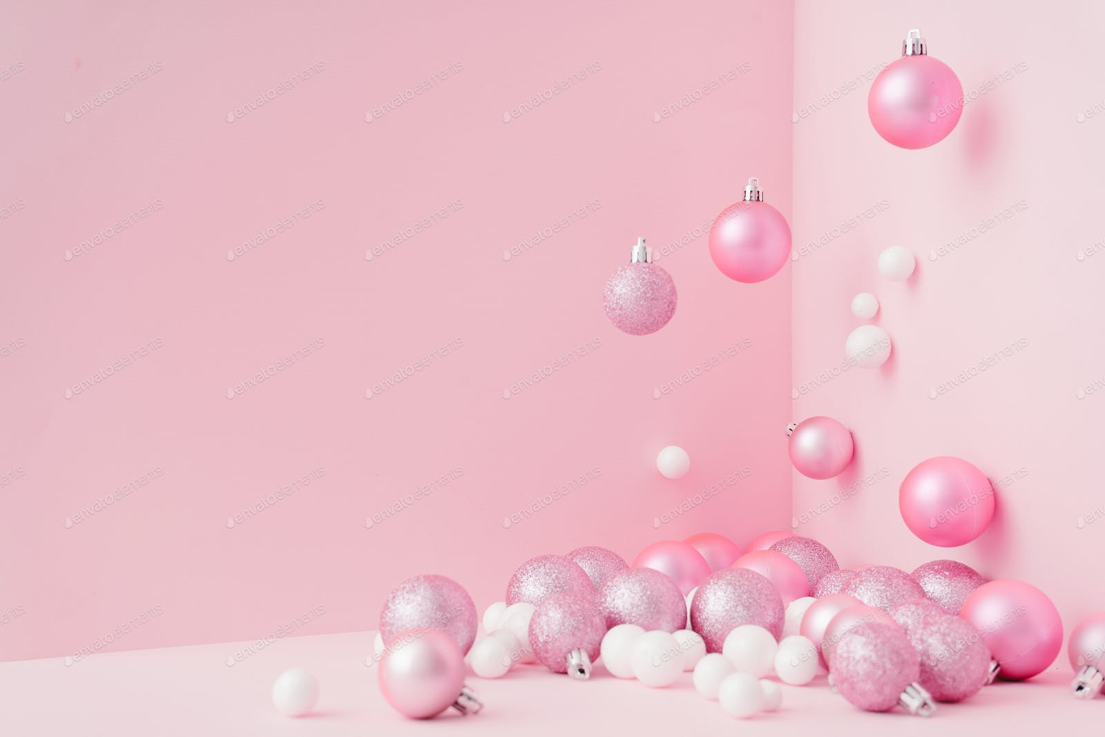 Creative Christmas design pink pastel color background. New Year concept. photo by zamurovic on Envato Elements