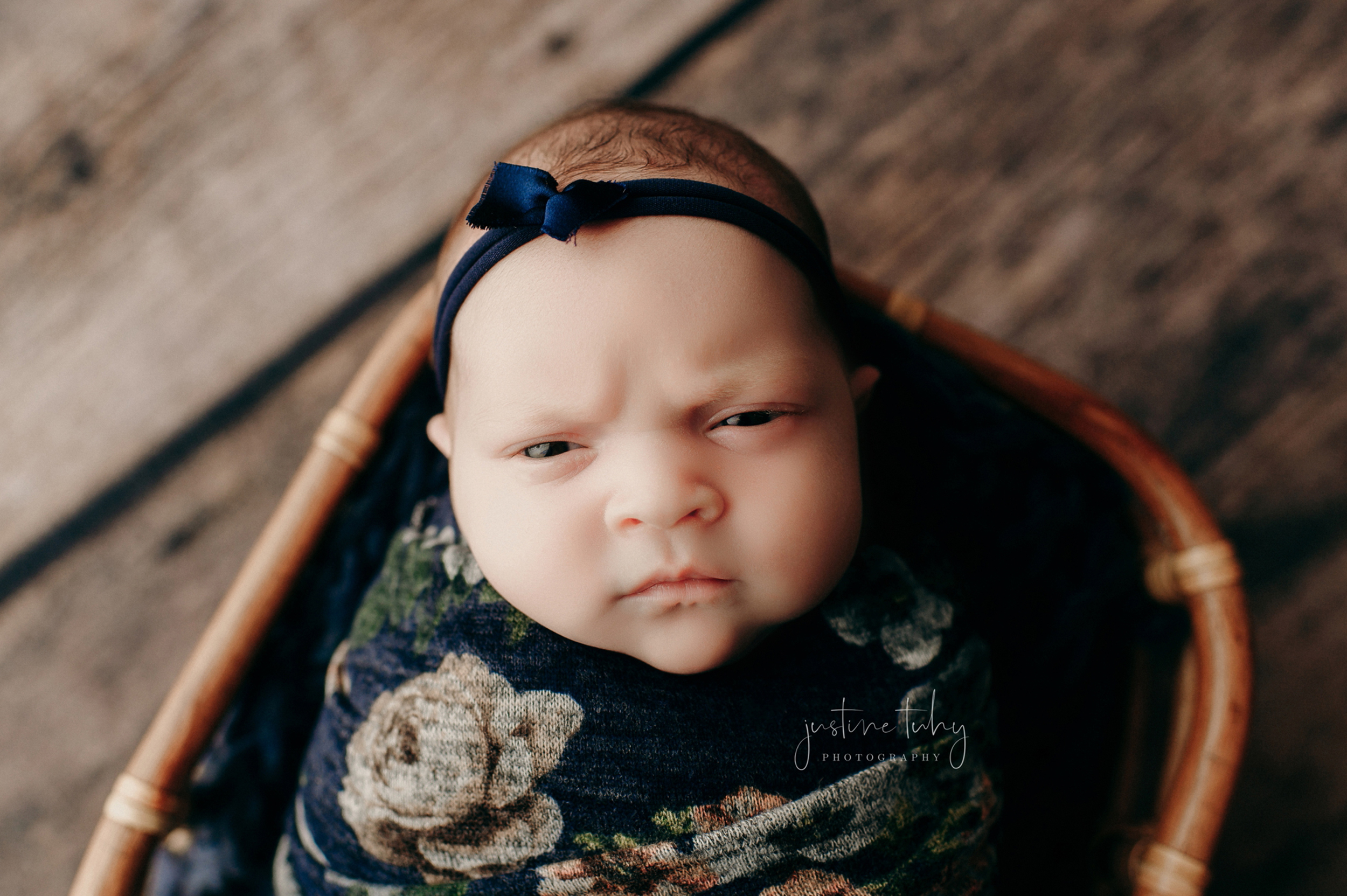 I love the mean mug': Baby's photo shoot scowl goes viral