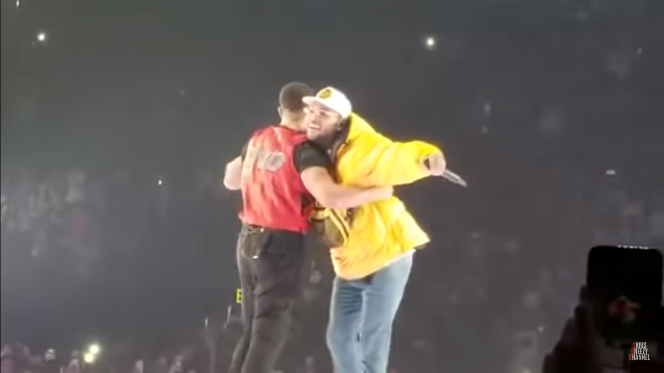 VIDEO: Watch The Moment Drake Brings Chris Brown On LA Stage
