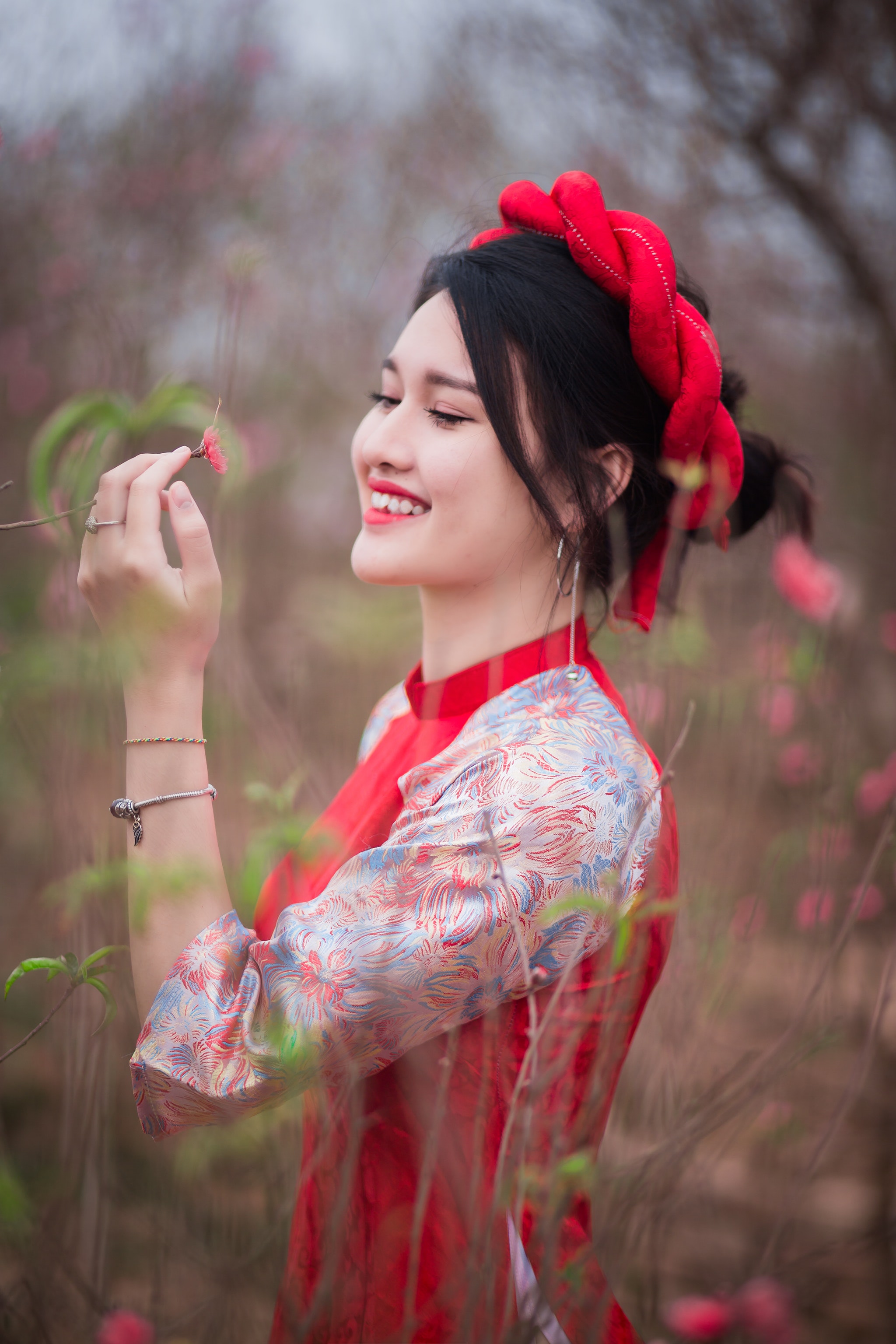 Woman Wearing White And Red Long Sleeved Dress · Free