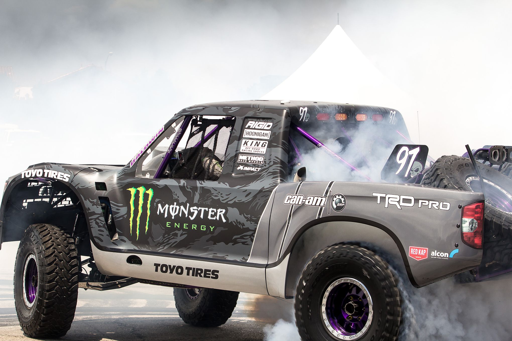 Rocking-across-desert-with-Baldwin,-Monster-Energy-truck